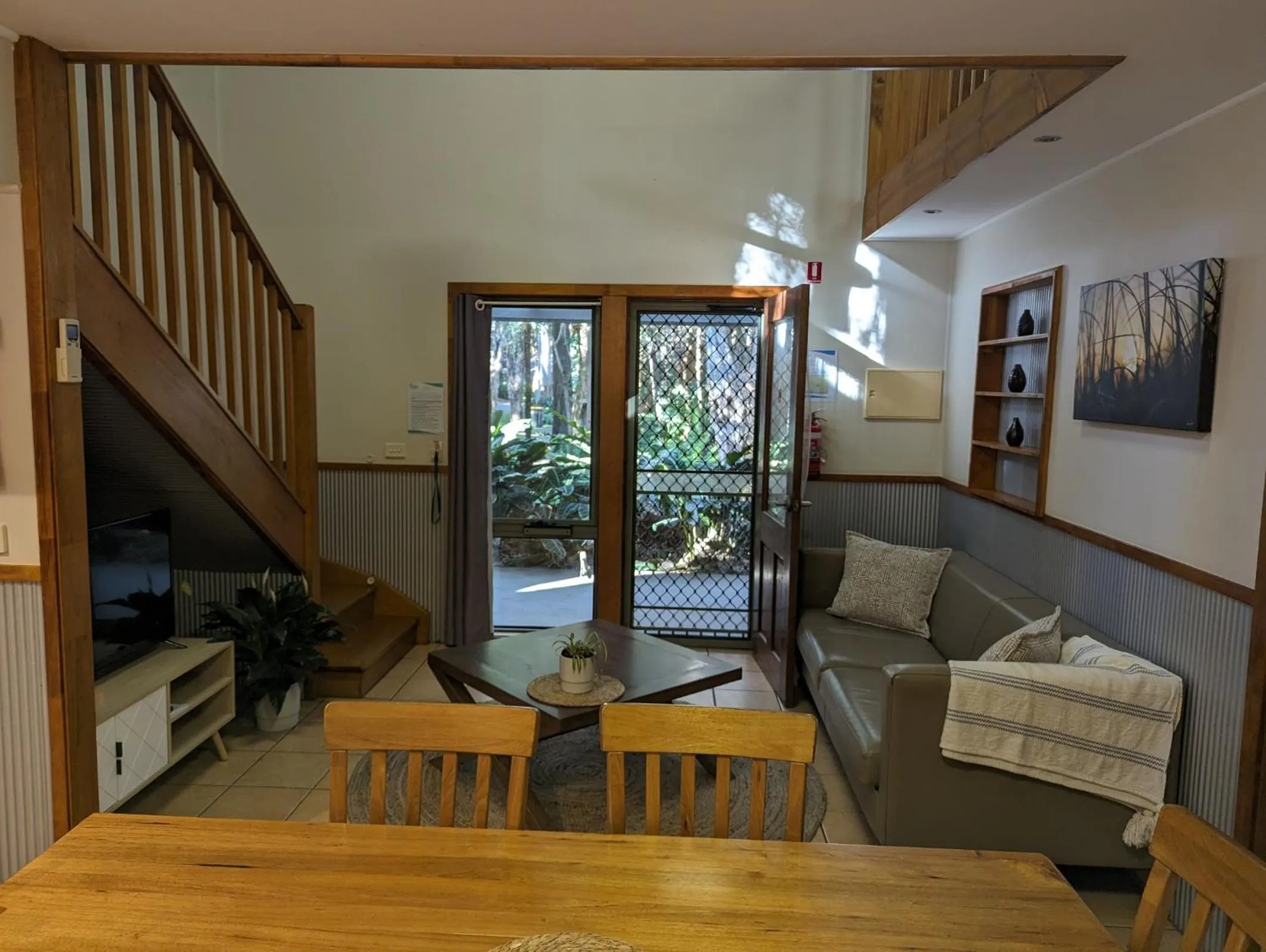 Living room in The Oasis at One Mile Beach