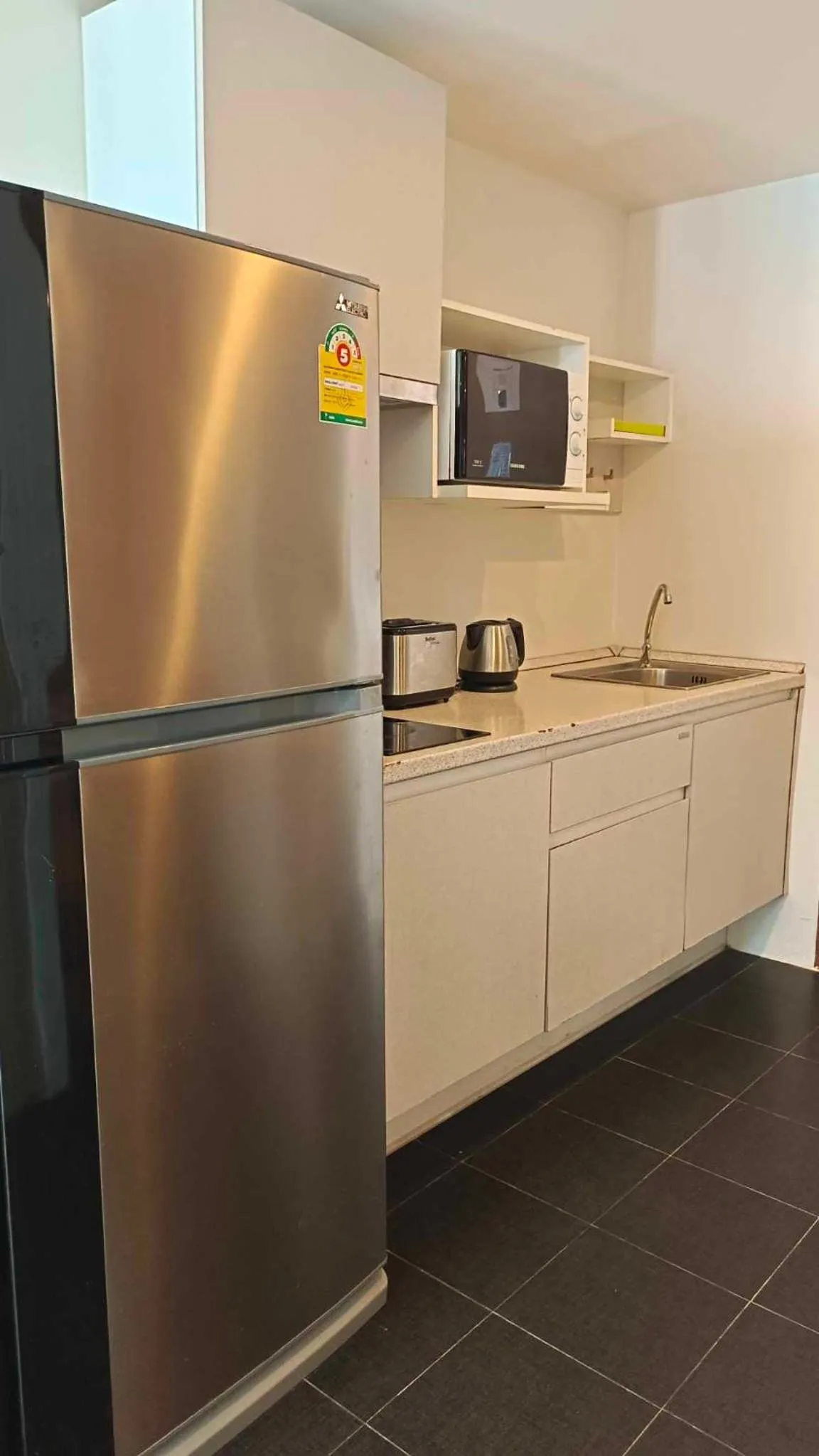 Kitchen or kitchenette in The Kaze 34 Hotel and Serviced Residence