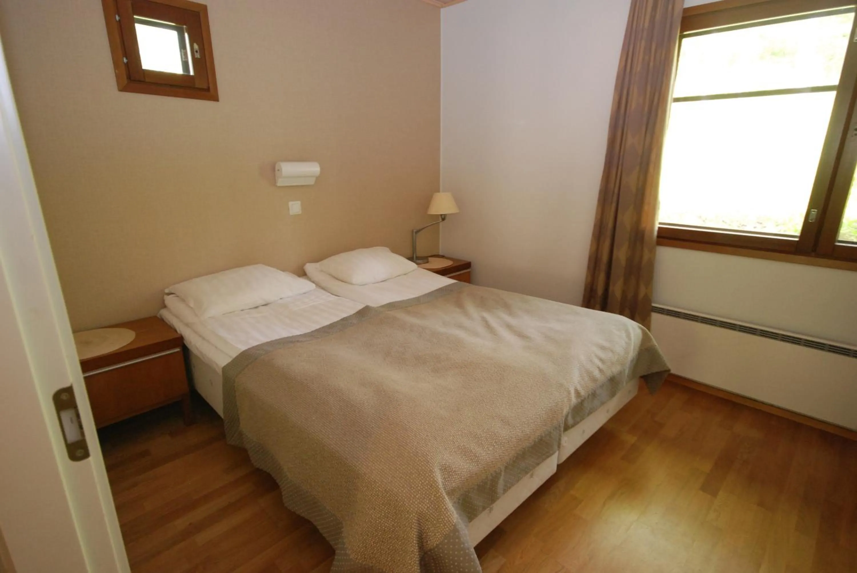 Bedroom, Bed in Imatran Kylpylä Spa Apartments