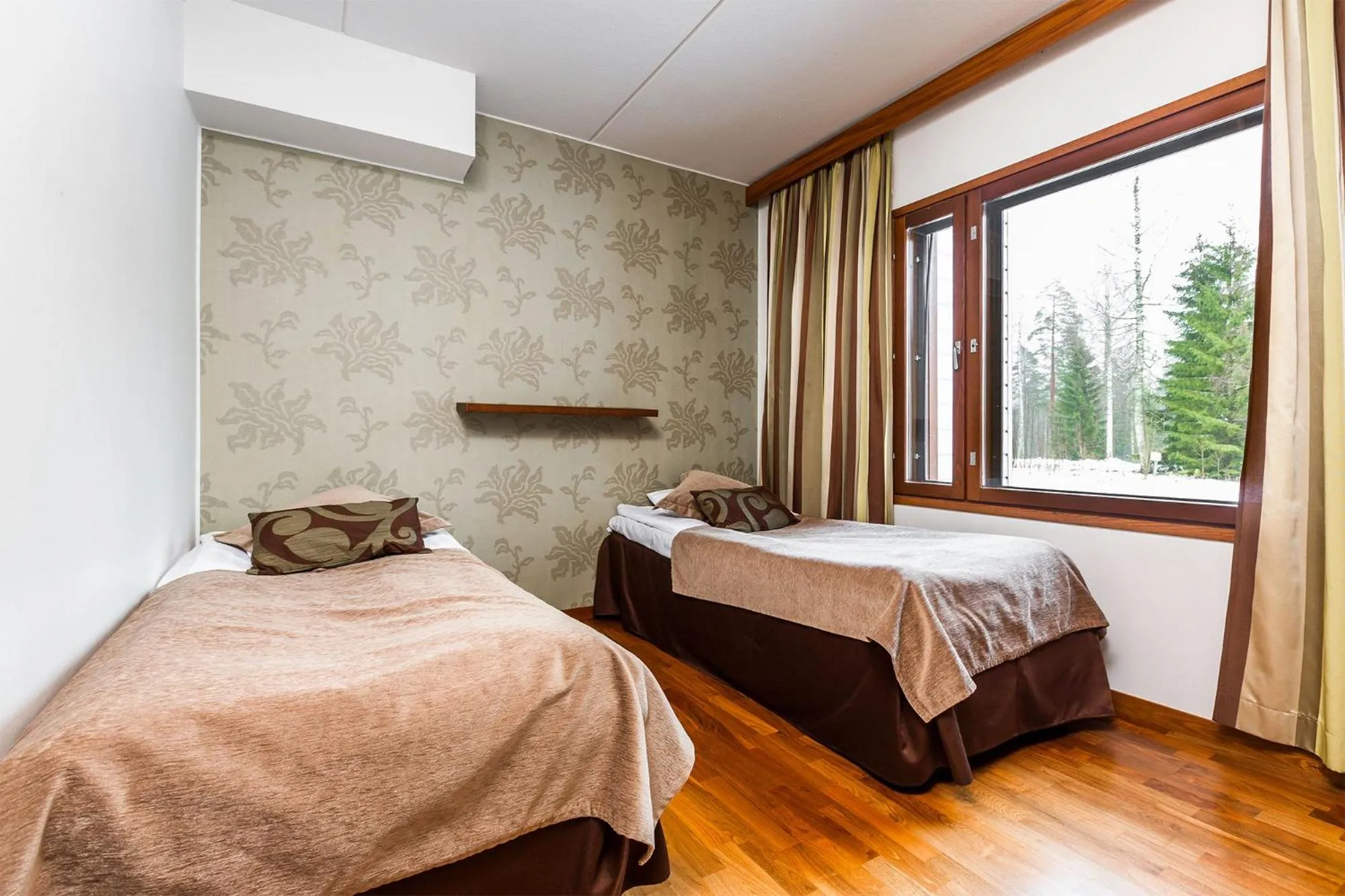 Bedroom, Bed in Imatran Kylpylä Spa Apartments