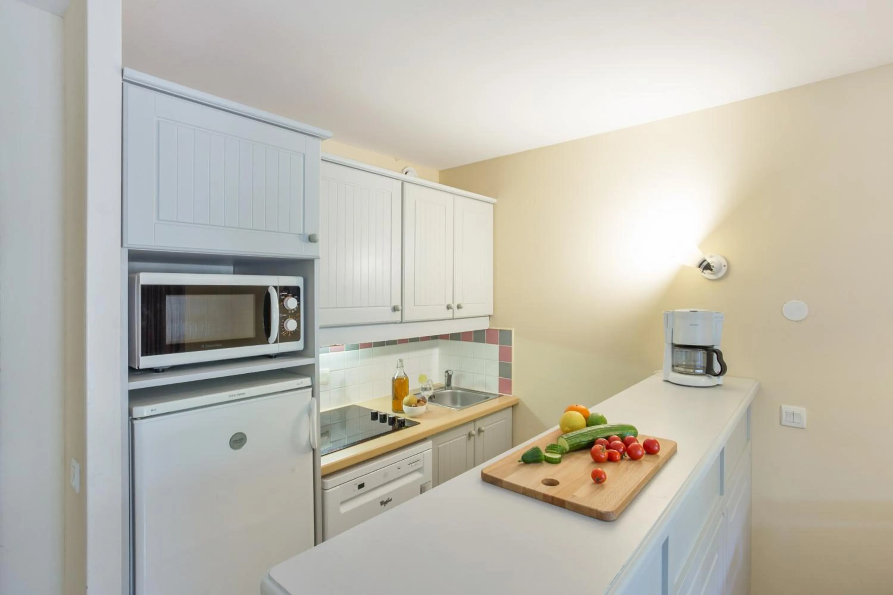 Kitchen or kitchenette in Résidence Pierre & Vacances Les Dunes du Médoc