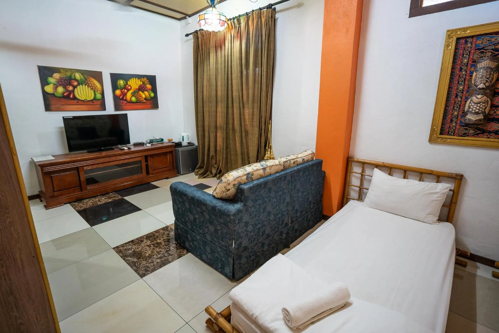 Seating area, Bed in Lost Paradise Resort