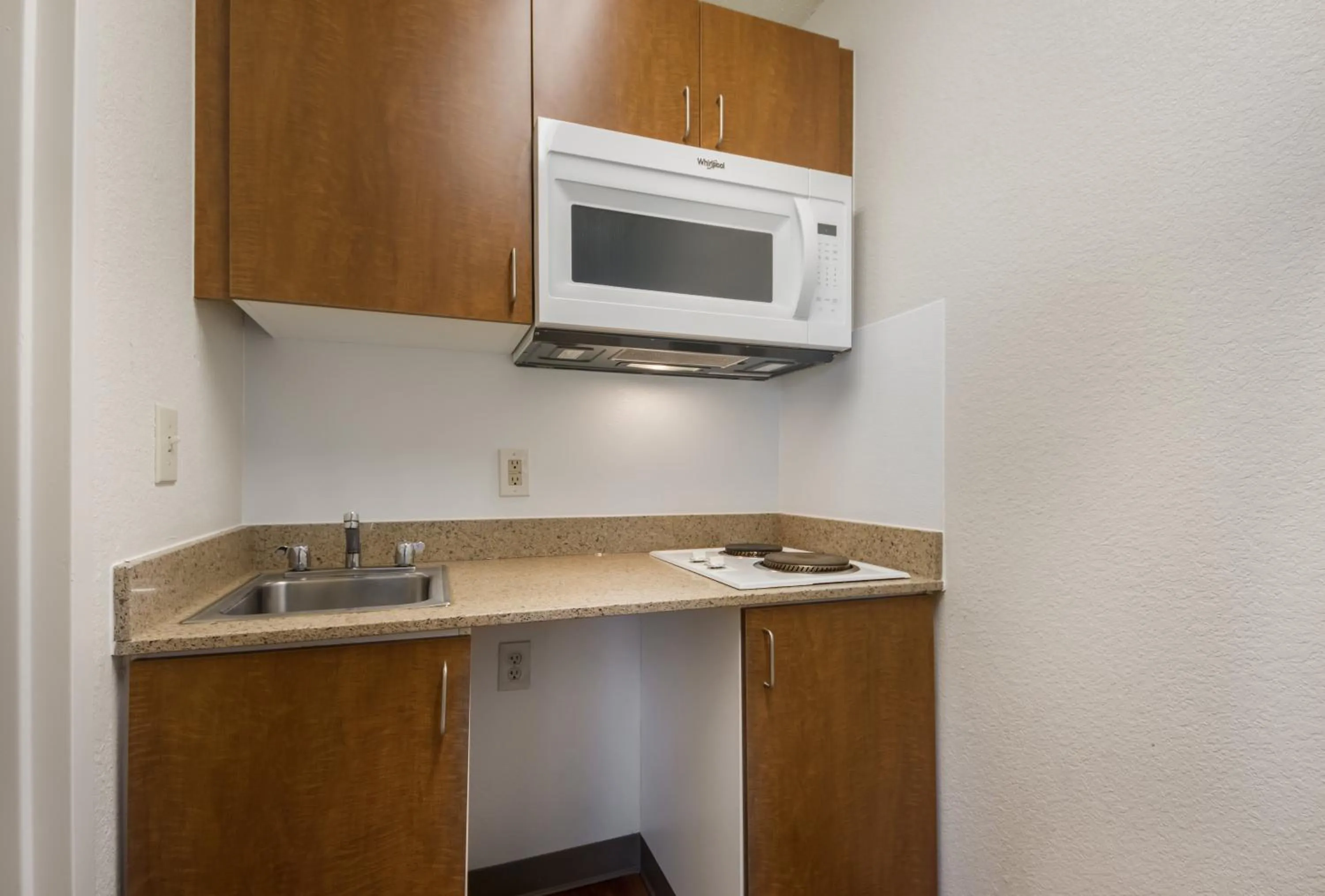 Photo of the whole room in HomeTowne Studios by Red Roof Dallas - Mesquite