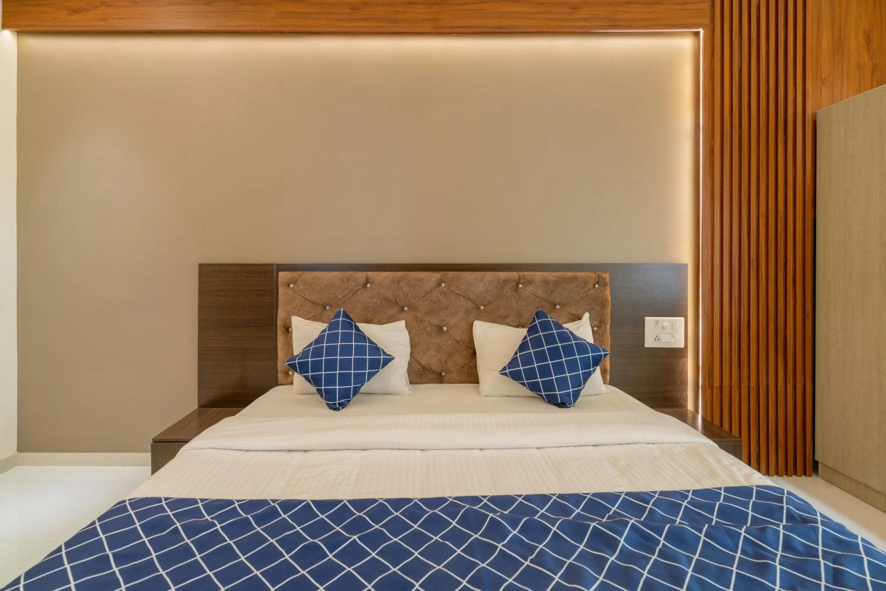 Bed in THE SURRYA MAX RESIDENCY