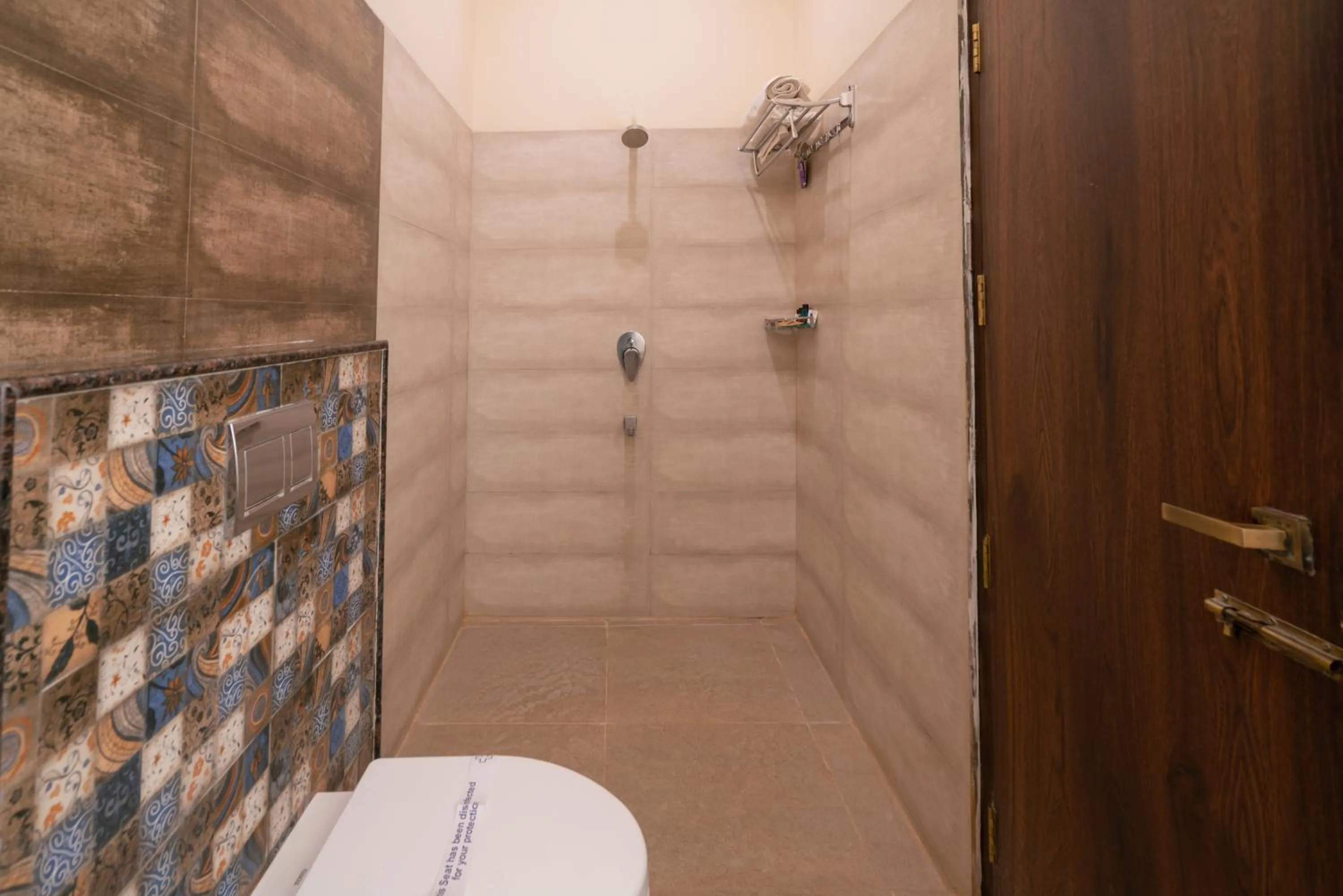 Toilet in THE SURRYA MAX RESIDENCY