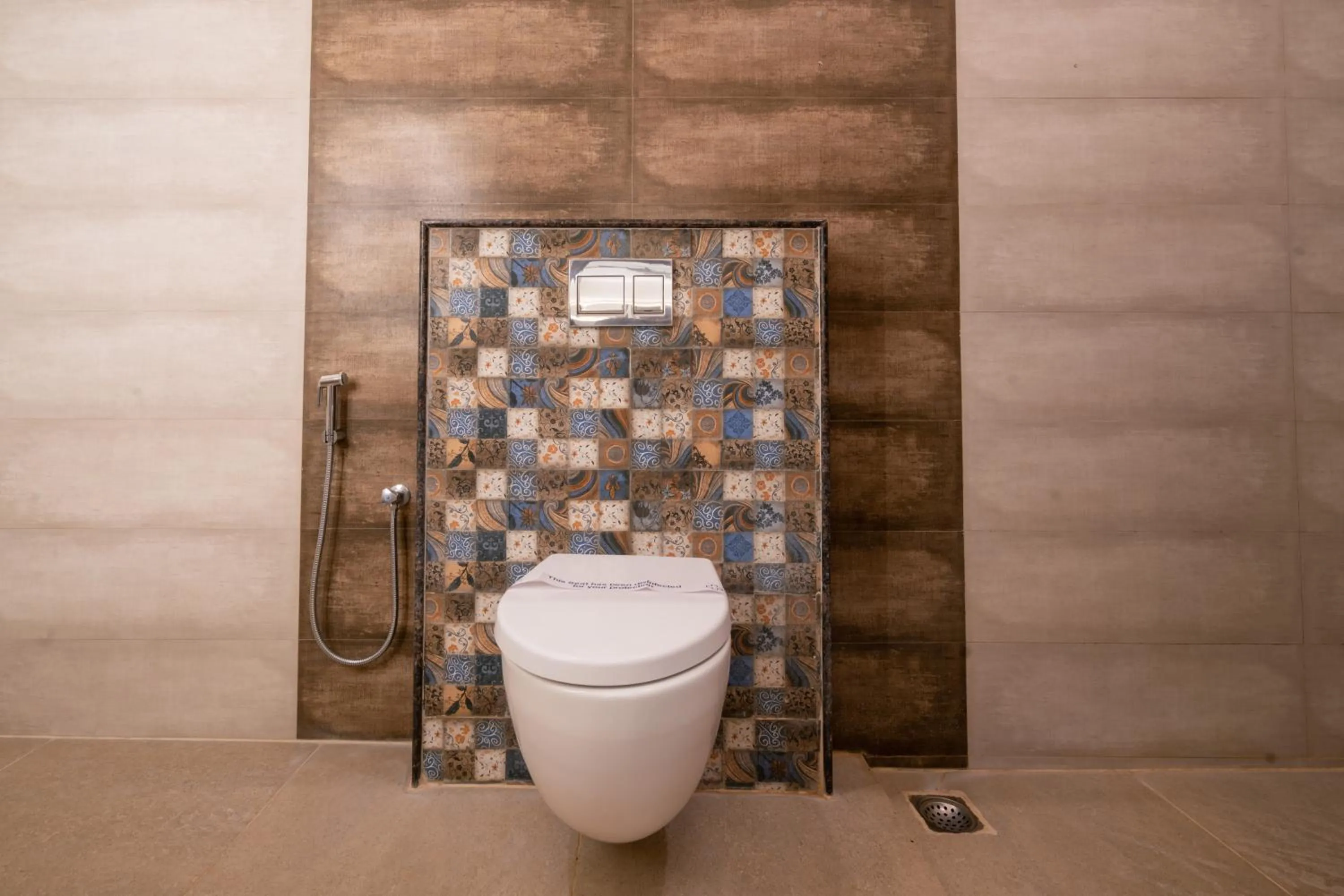 Toilet in THE SURRYA MAX RESIDENCY