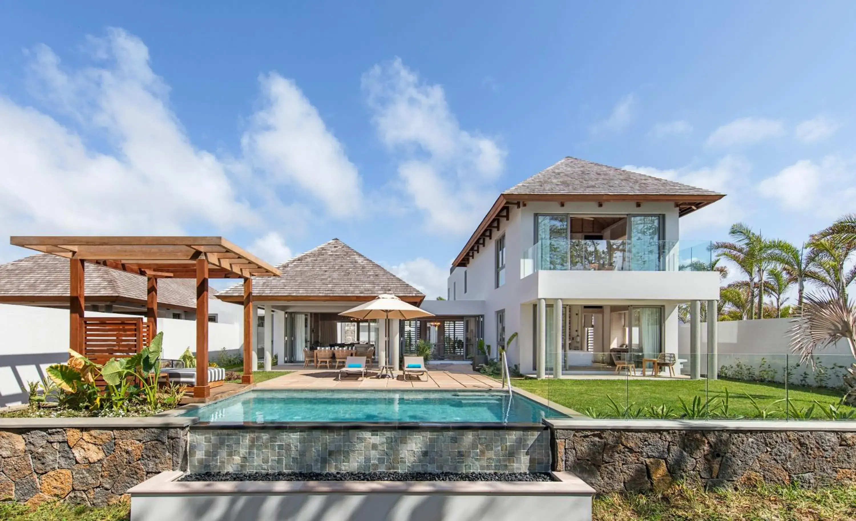 Pool view in Anantara Iko Mauritius Resort & Villas Pool view in Anantara Iko Mauritius Resort & Villas