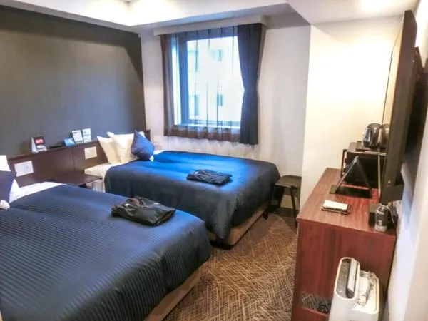 Bedroom, Bed in Natural Hot Spring Hotel Livemax Premium Hiroshima