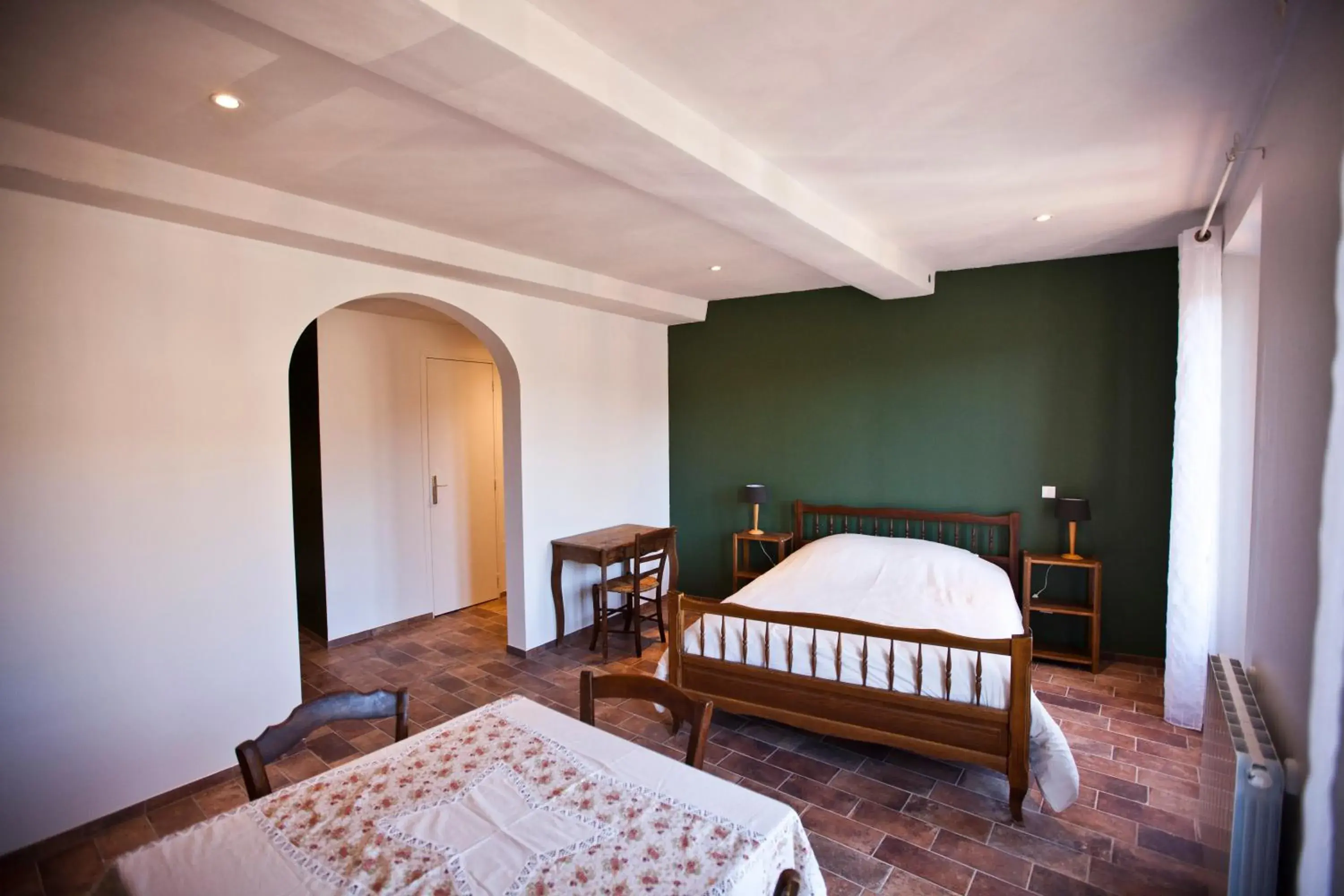 Quadruple Room with Private Bathroom in Hôtel de la Place Quadruple Room with Private Bathroom in Hôtel de la Place