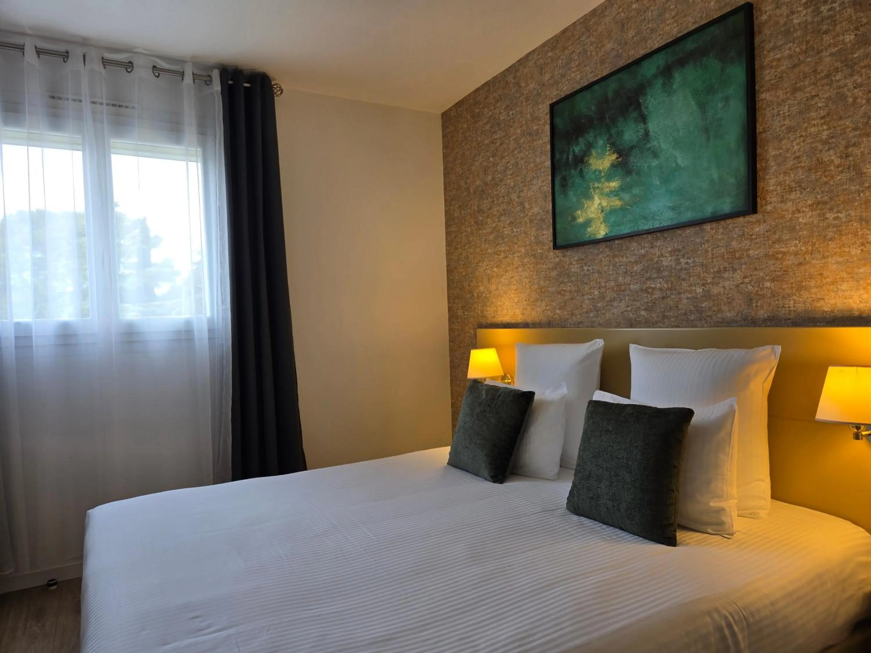 Bed in Hôtel Le SAINT-GENIÈS