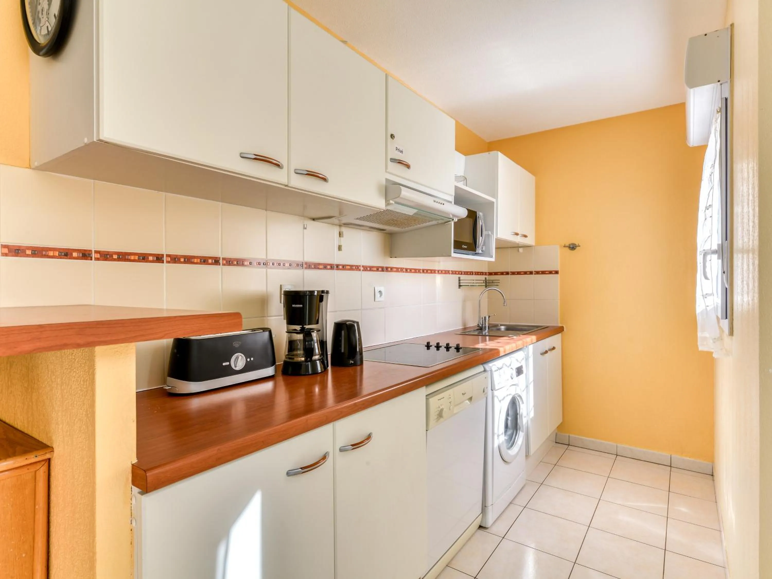 kitchen in Vacancéole - Résidence Alizéa Beach