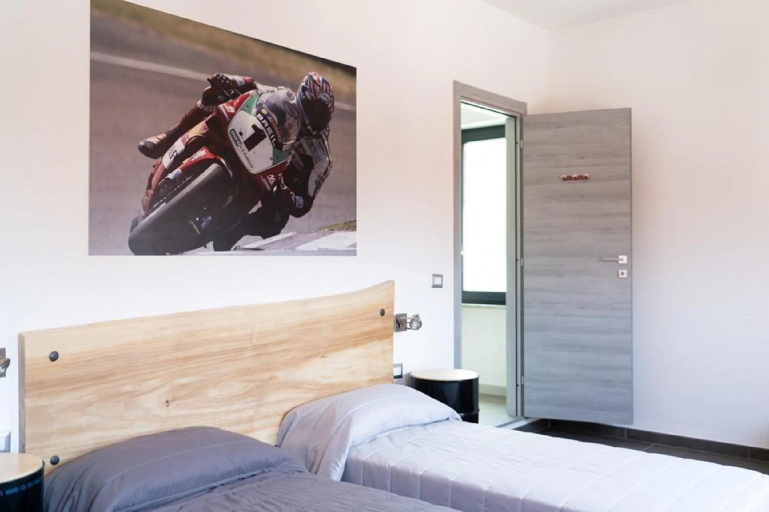 Bedroom in Italian Piston House Sport Moto Rent