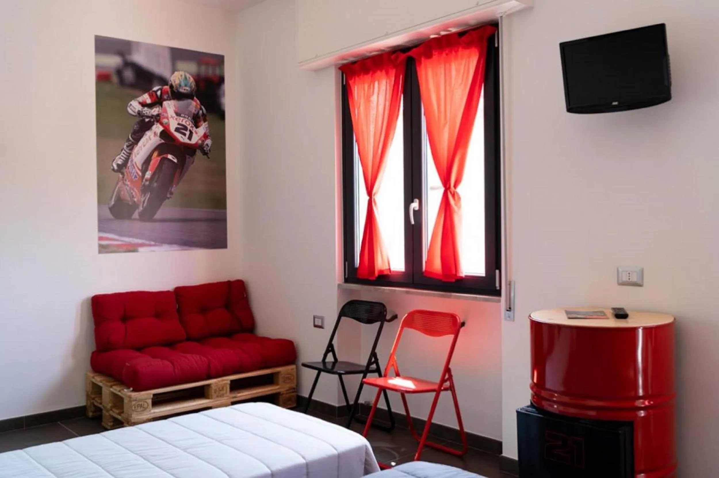 Bedroom in Italian Piston House Sport Moto Rent
