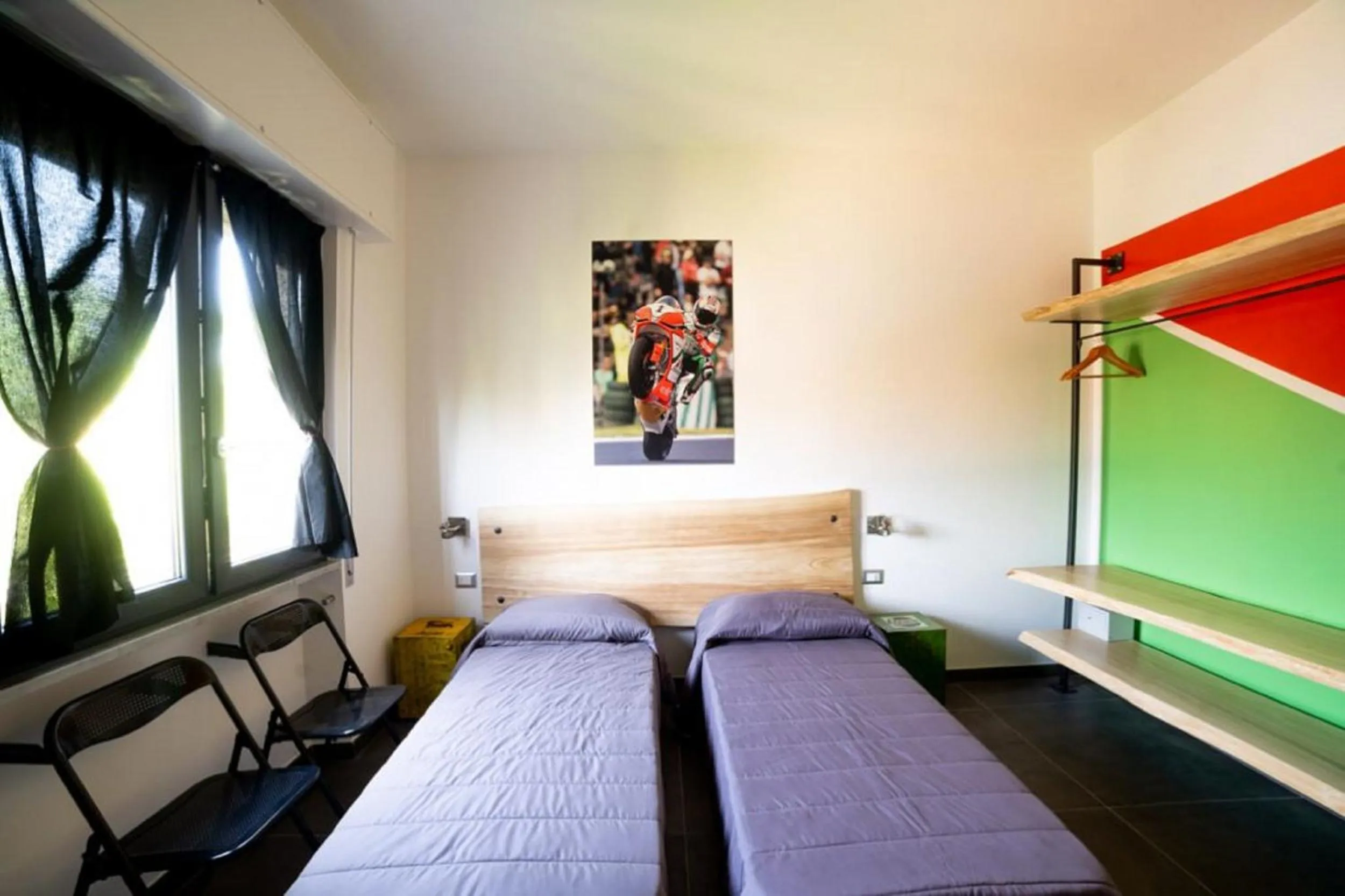 Photo of the whole room in Italian Piston House Sport Moto Rent