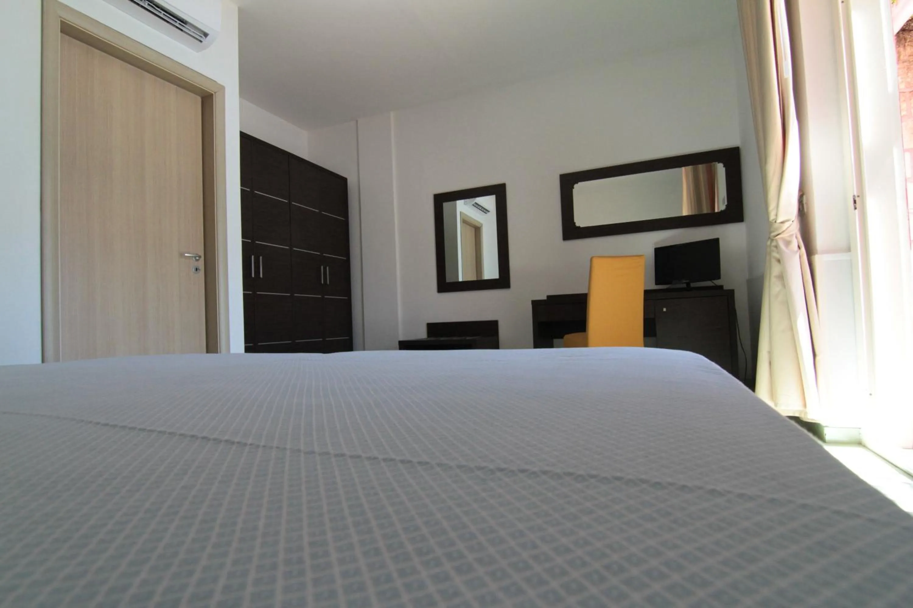 Bed in Club Esse Sunbeach