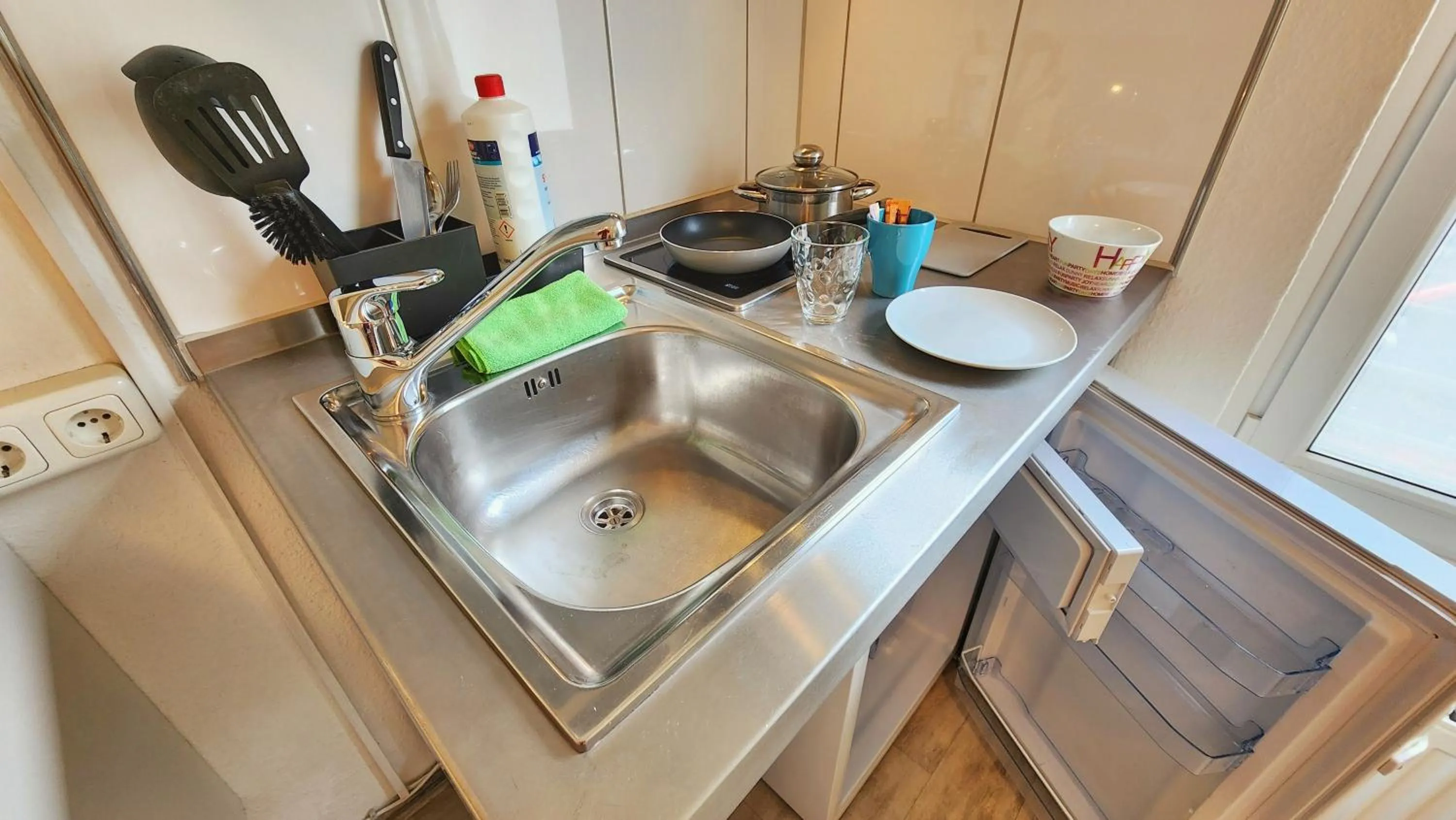 Kitchen or kitchenette in Aparthotel B & L