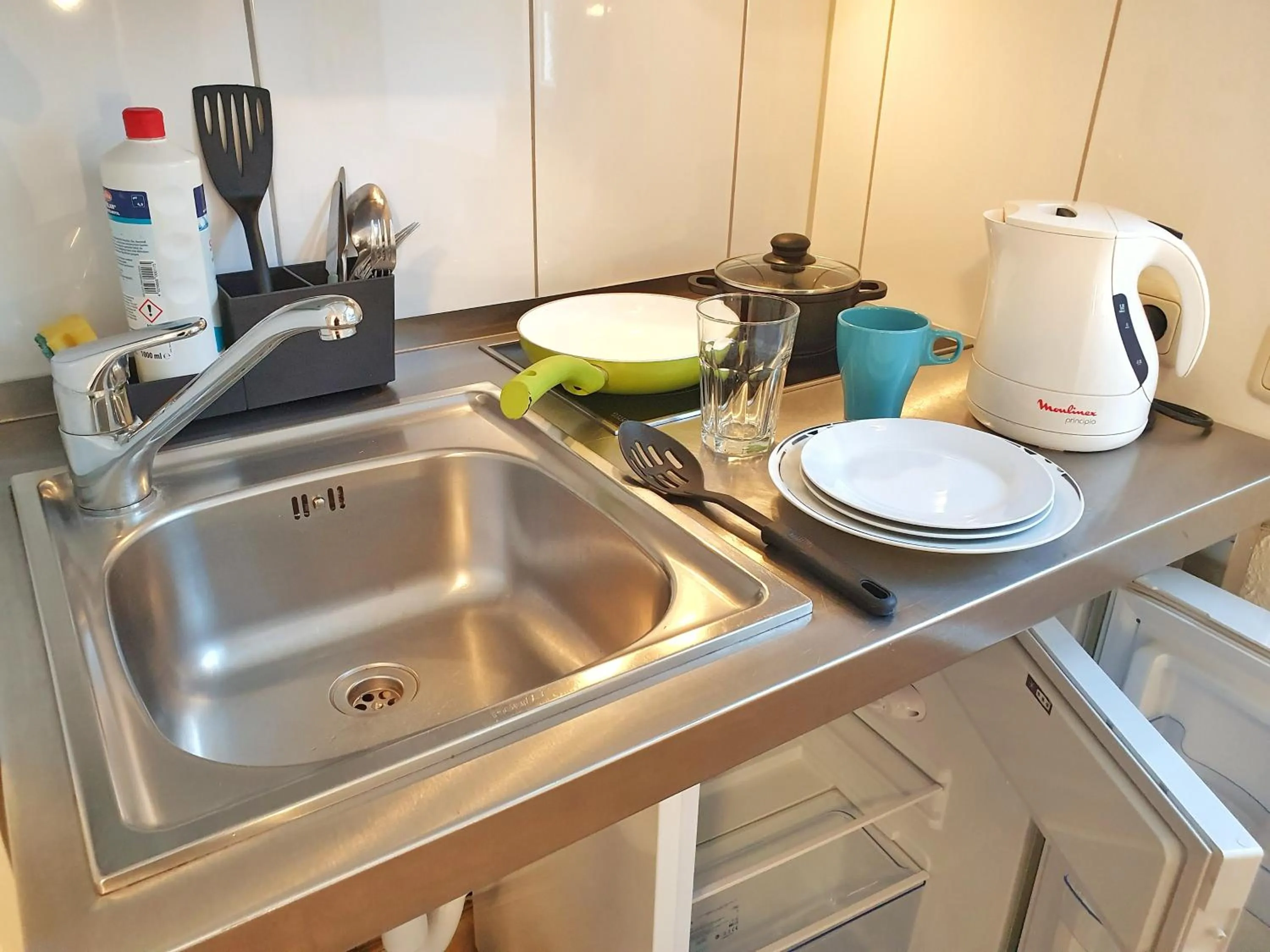 Kitchen or kitchenette in Aparthotel B & L