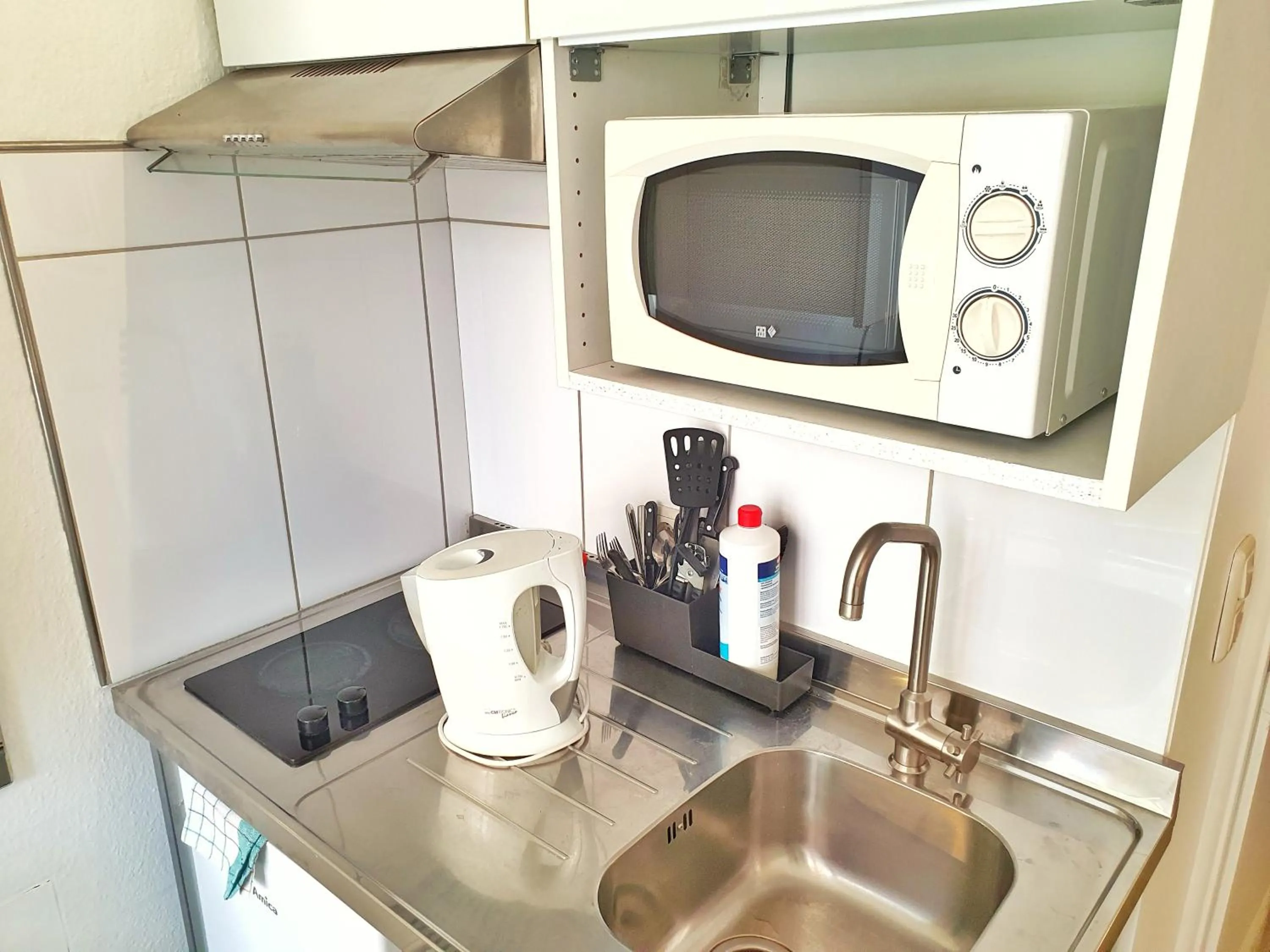 Kitchen or kitchenette in Aparthotel B & L