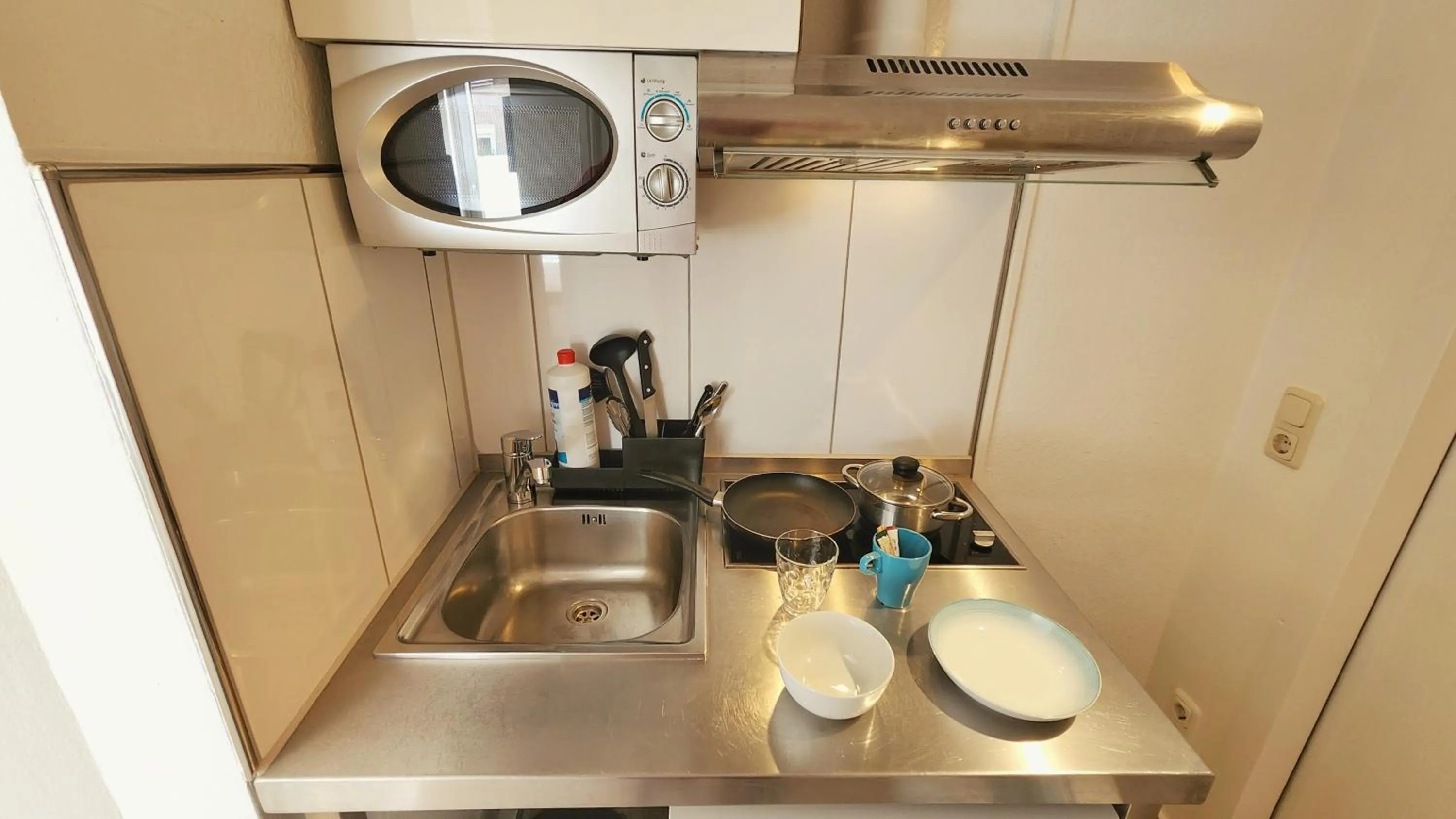 Kitchen or kitchenette in Aparthotel B & L