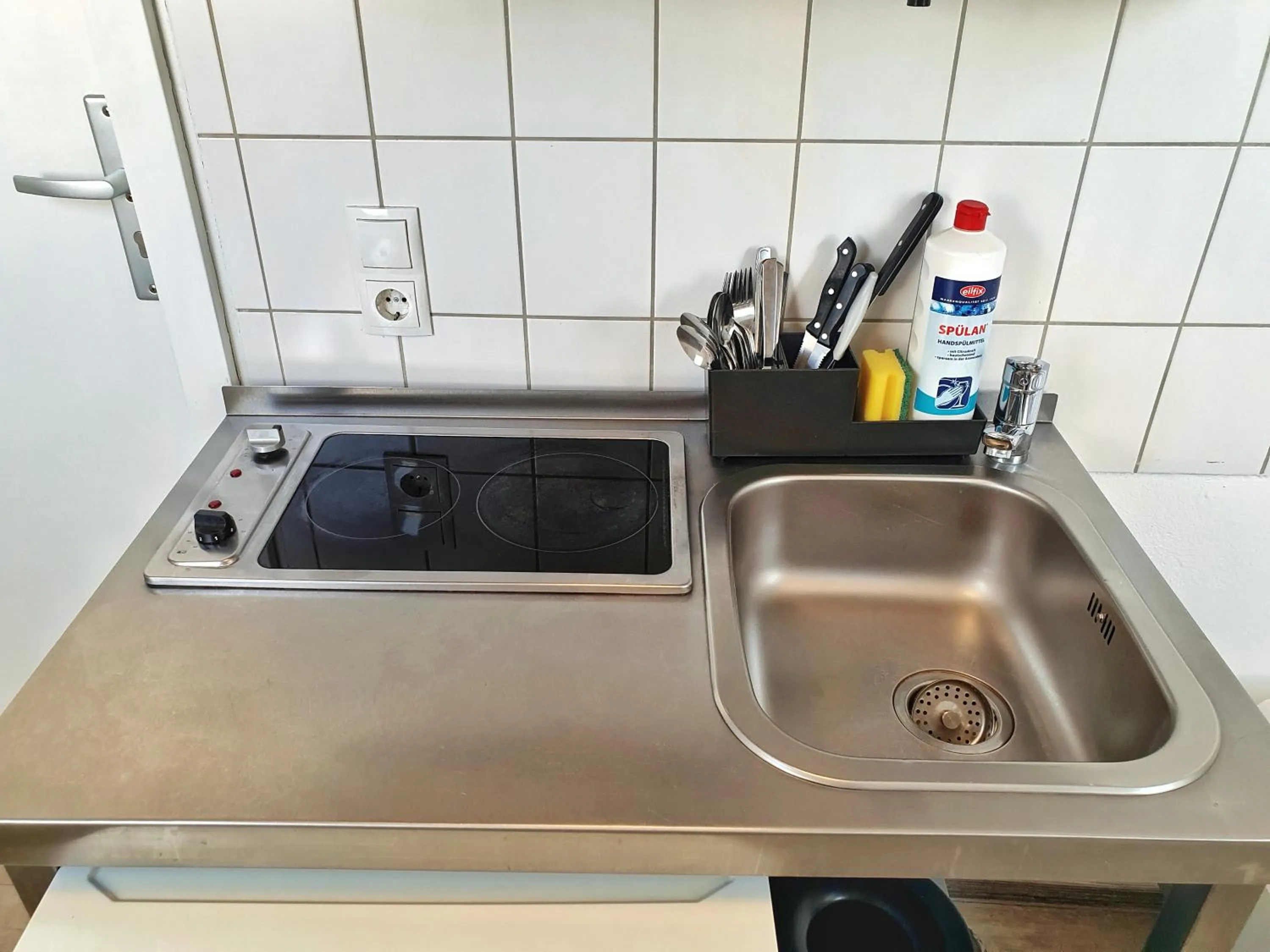 Kitchen or kitchenette in Aparthotel B & L