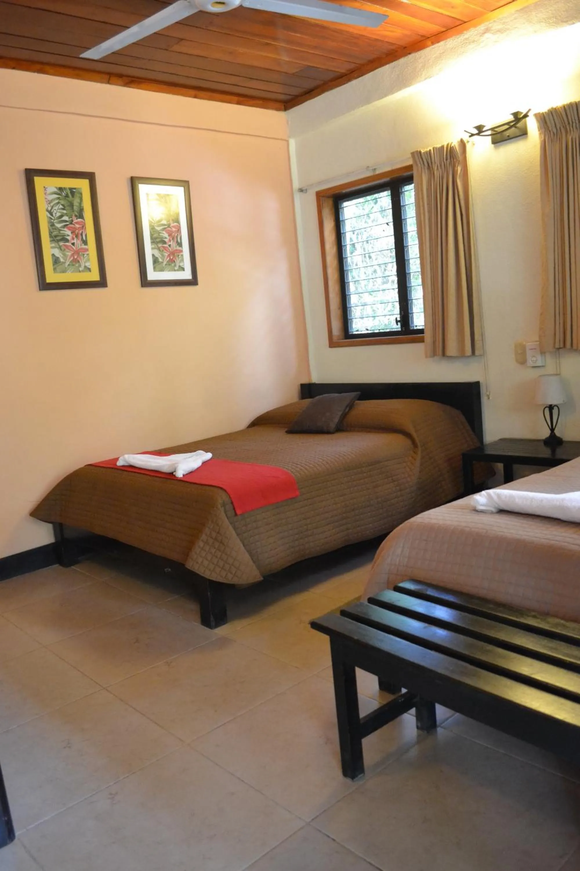 Decorative detail, Bed in Hotel Jaguar Inn Tikal