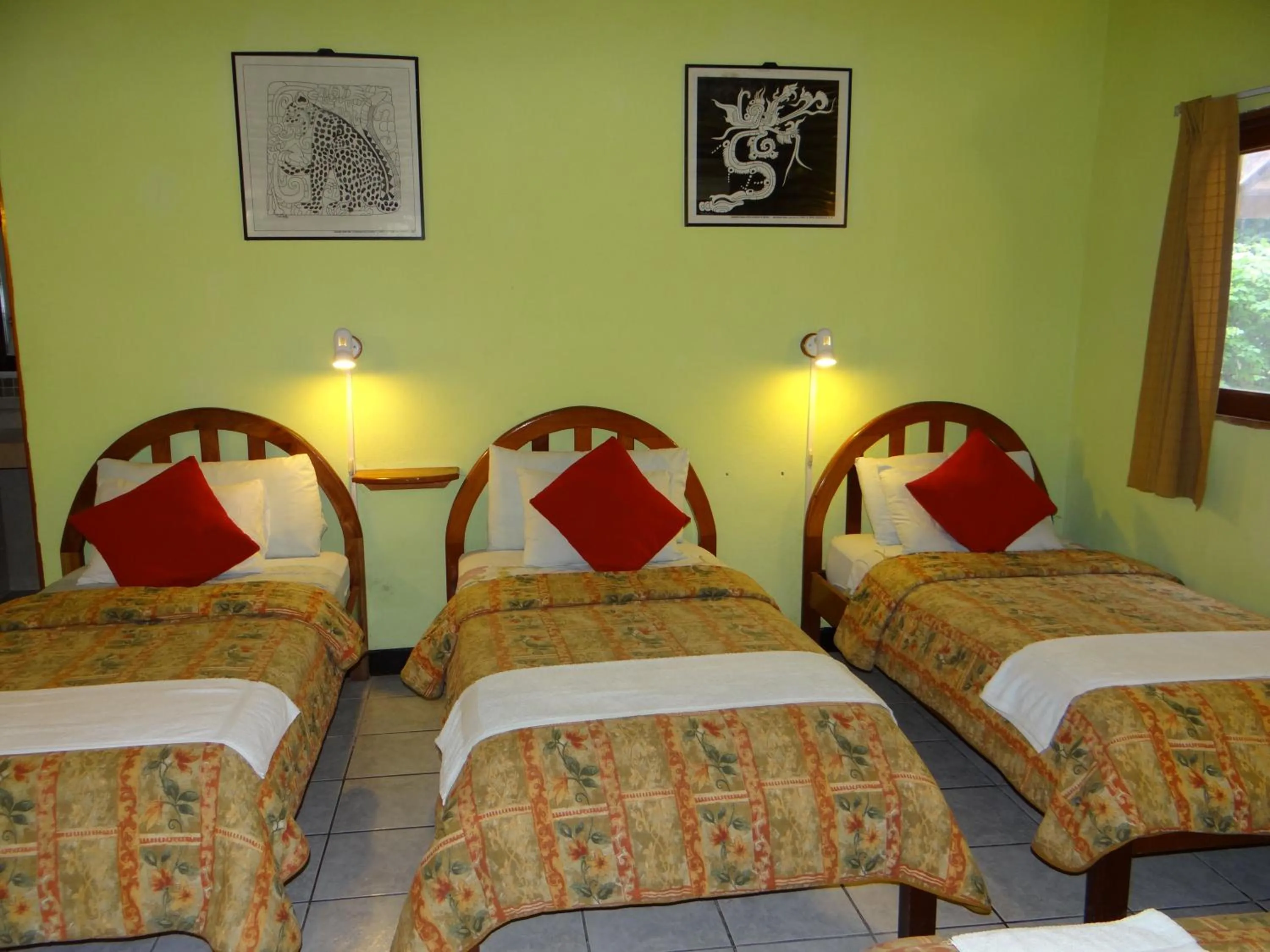 Bed in Hotel Jaguar Inn Tikal