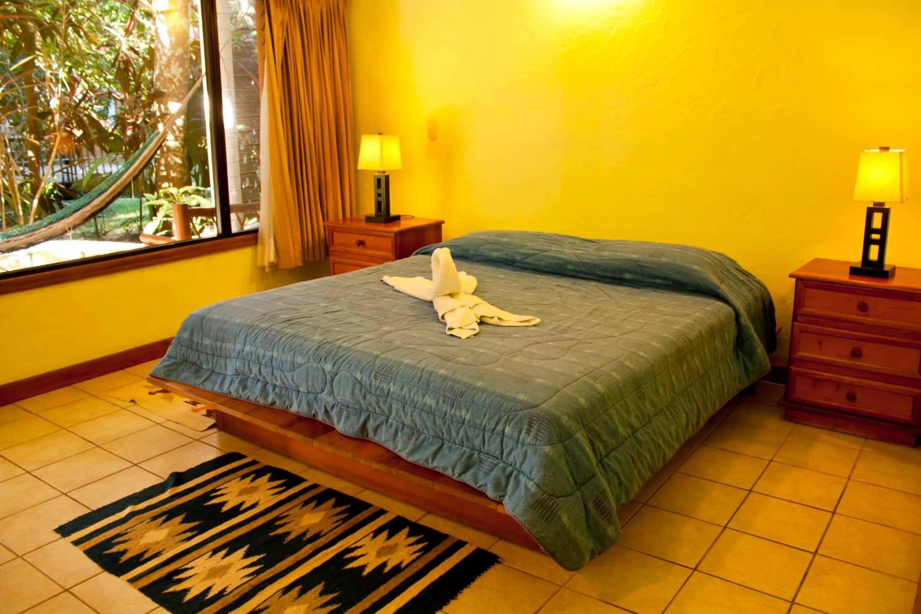 Bed in Hotel Jaguar Inn Tikal