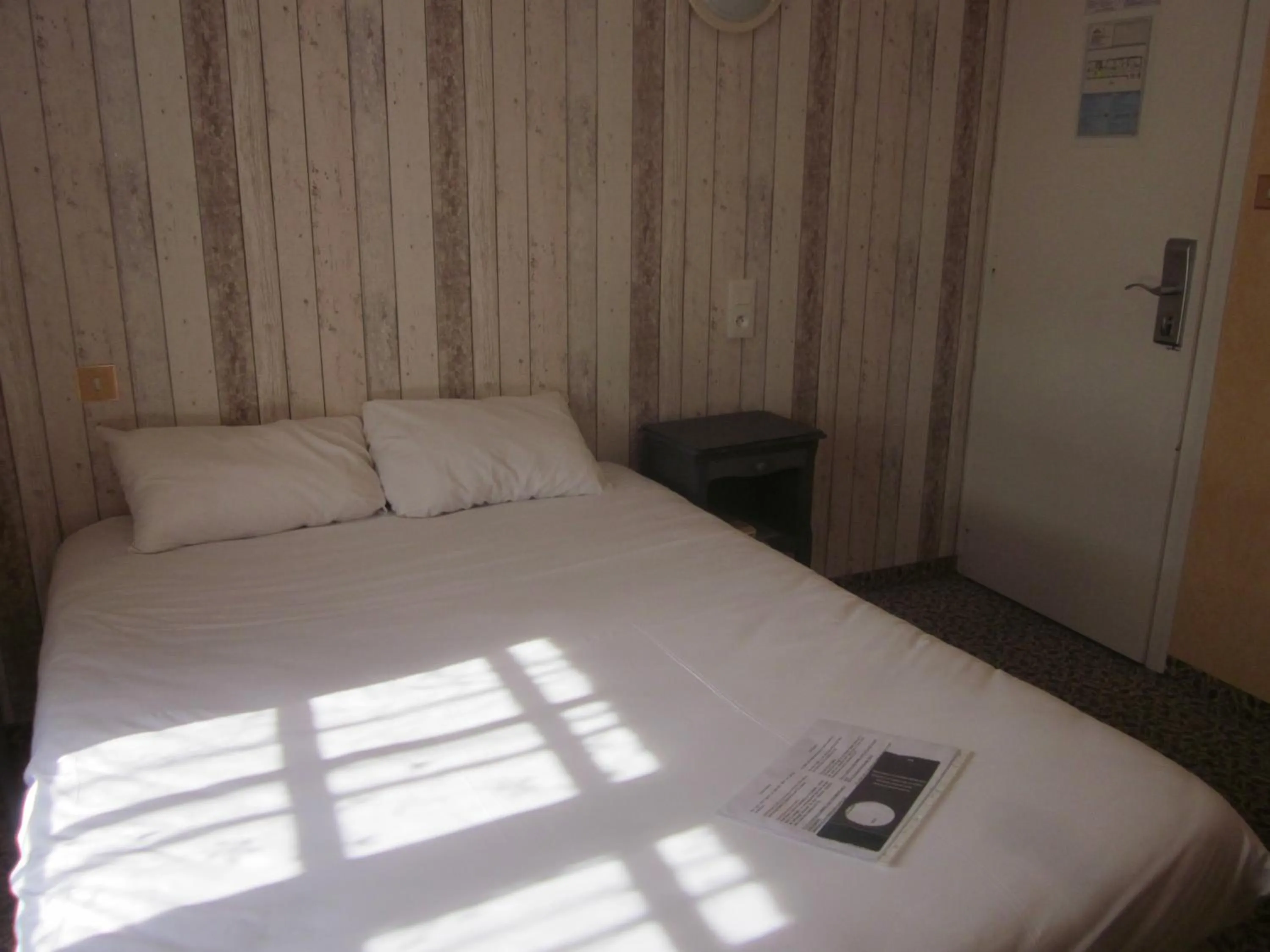 Bed in Hotel La Chaumière