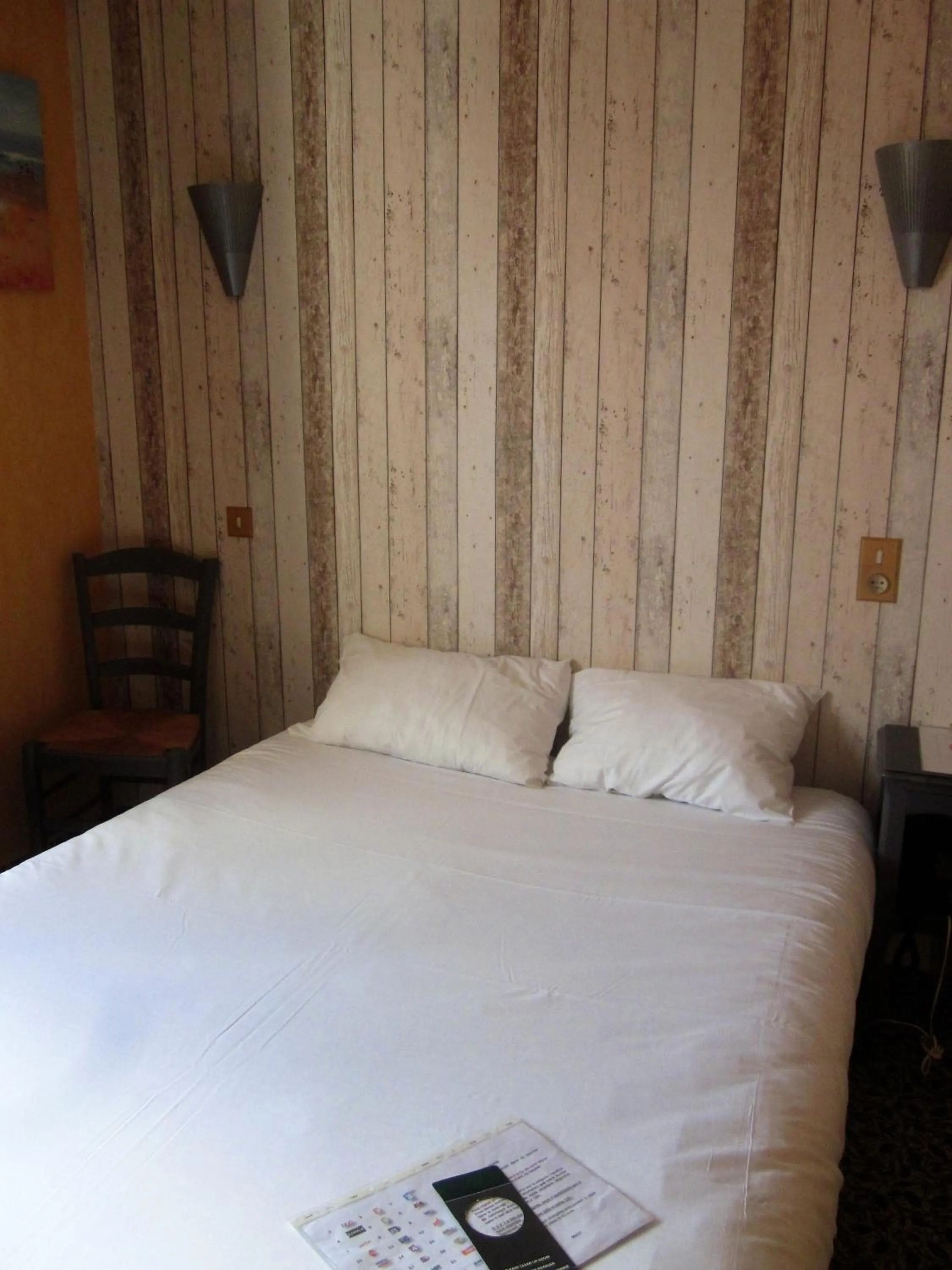 Bed in Hotel La Chaumière