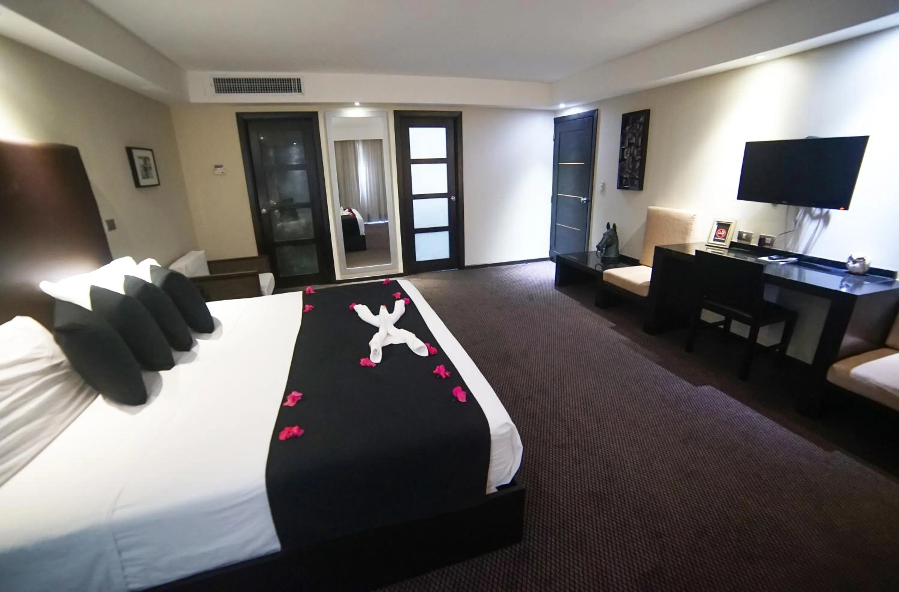 Bed in Savoy Hotel Boutique