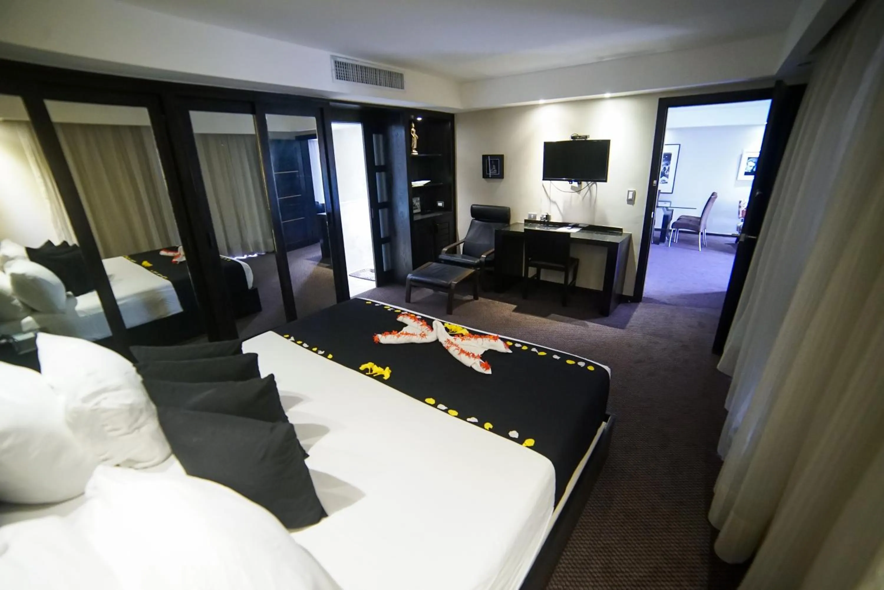 Bed in Savoy Hotel Boutique