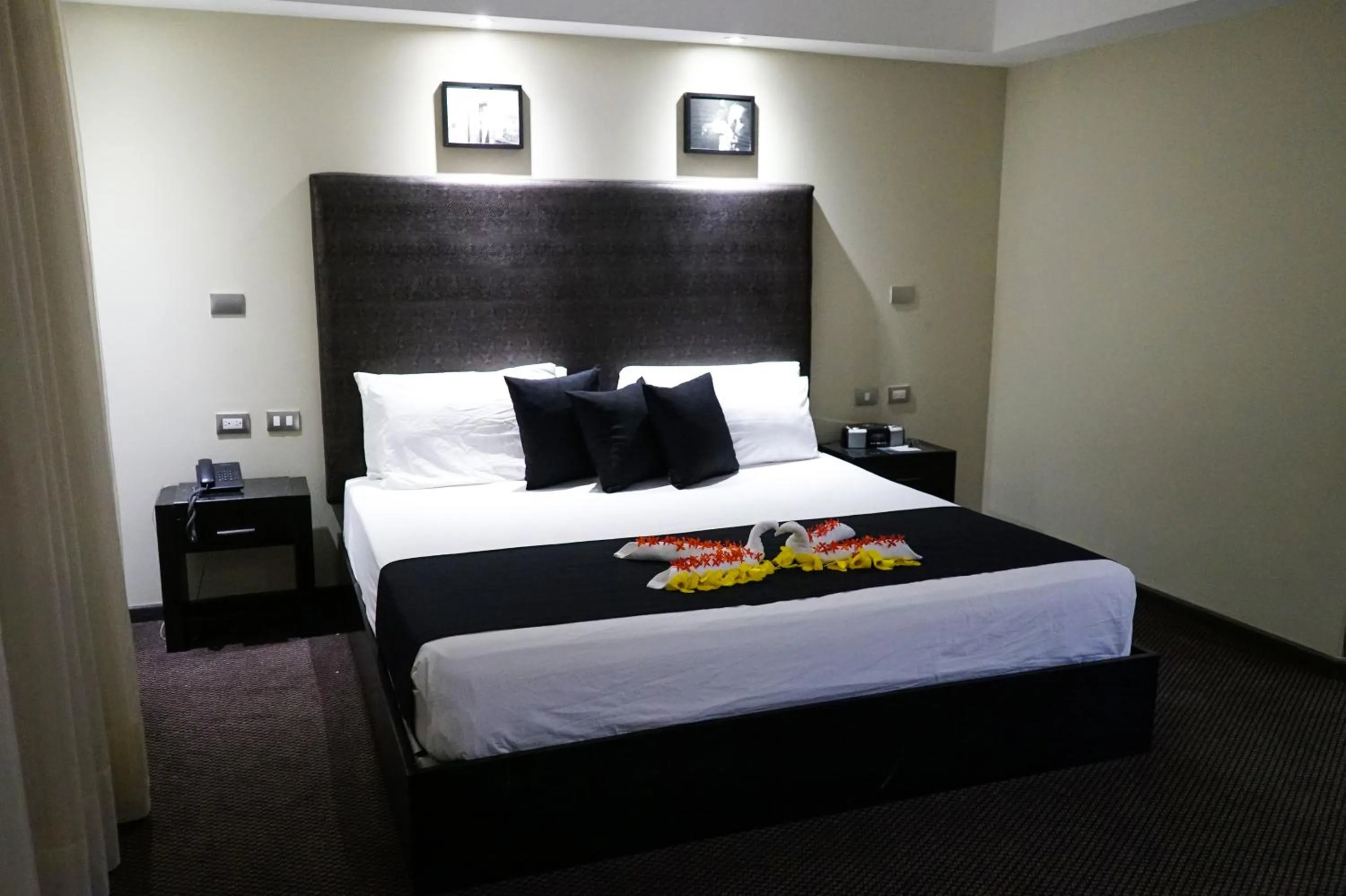 Bed in Savoy Hotel Boutique