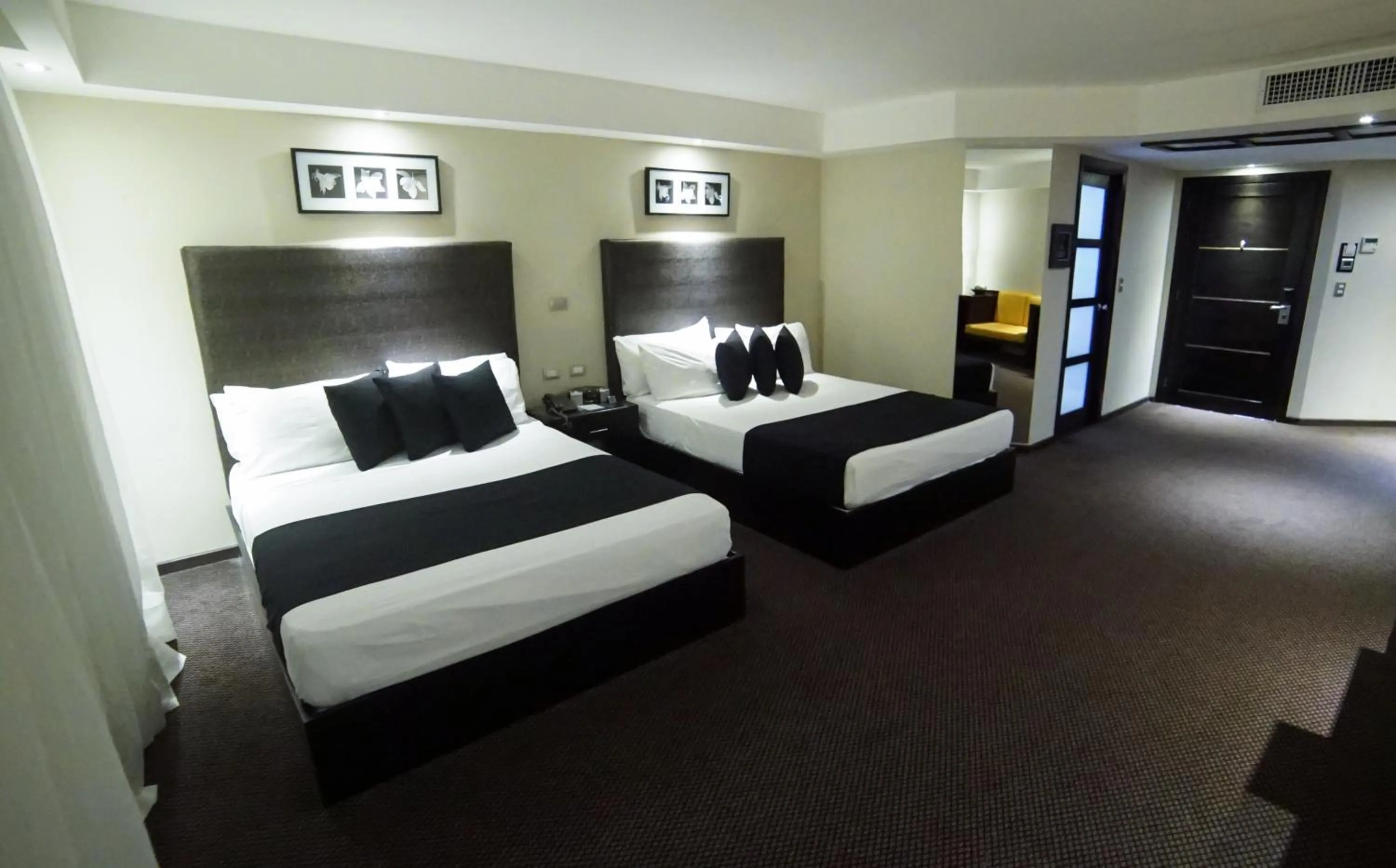 Bed in Savoy Hotel Boutique