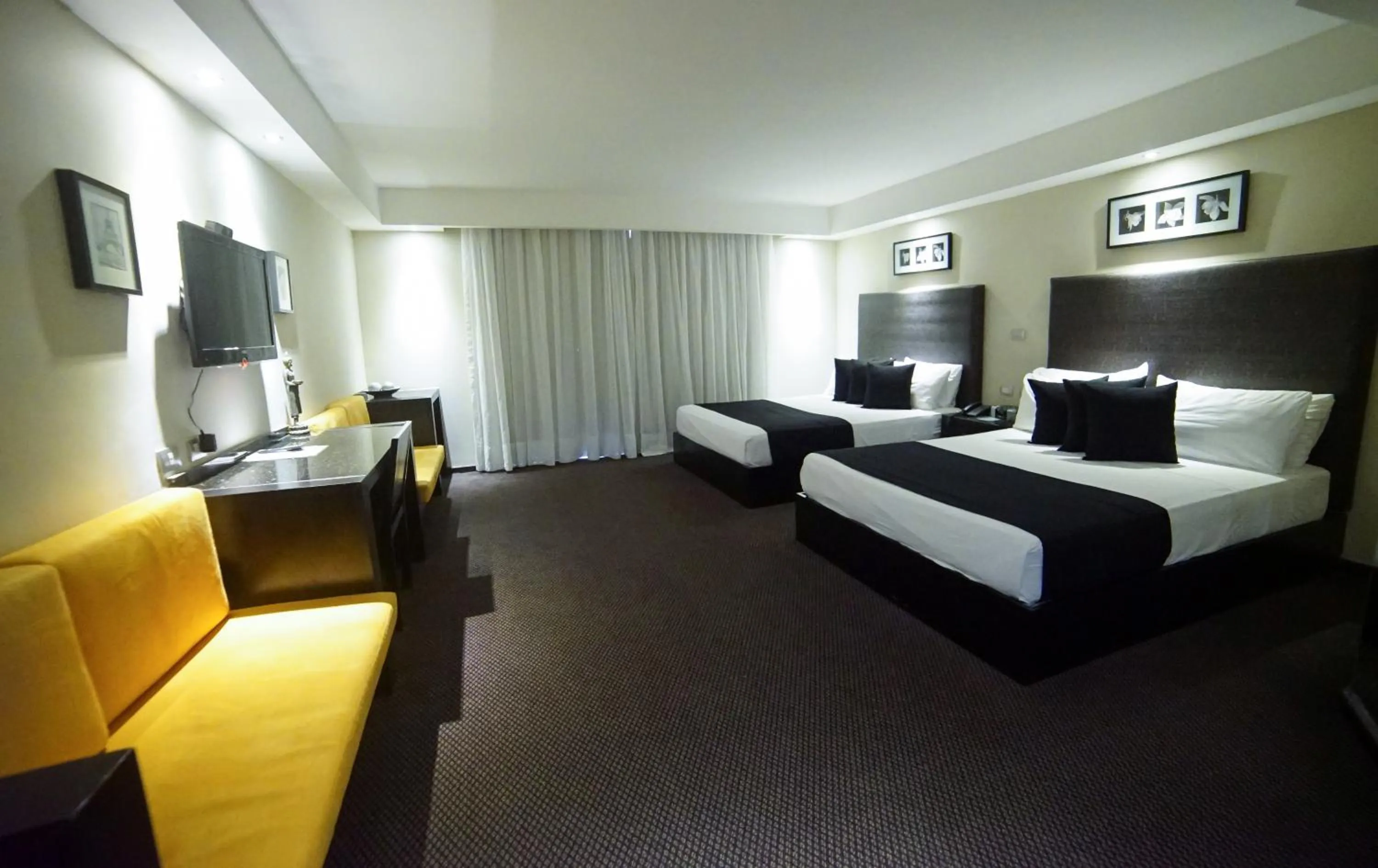 Photo of the whole room, Bed in Savoy Hotel Boutique