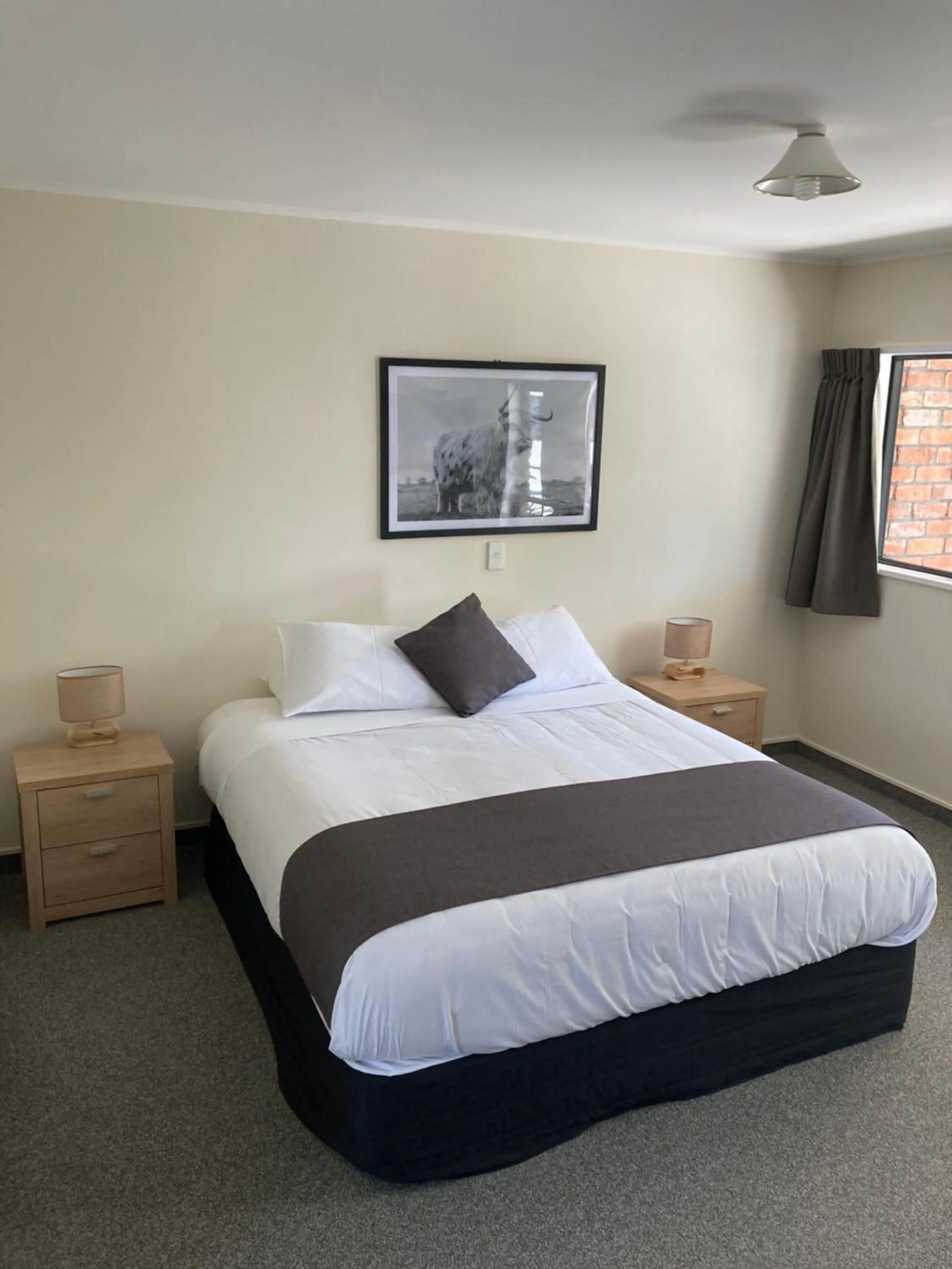 Bed in Heritage Highway Motel