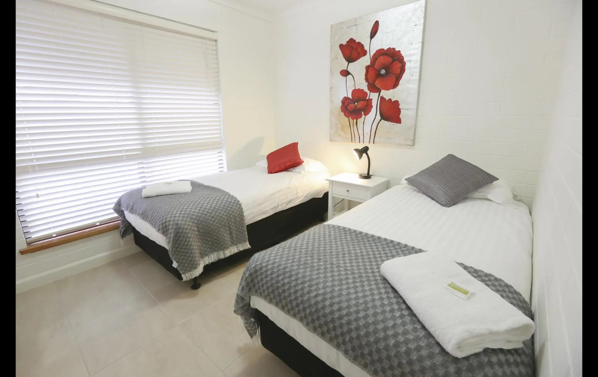 Bed in Mildura Holiday Villas