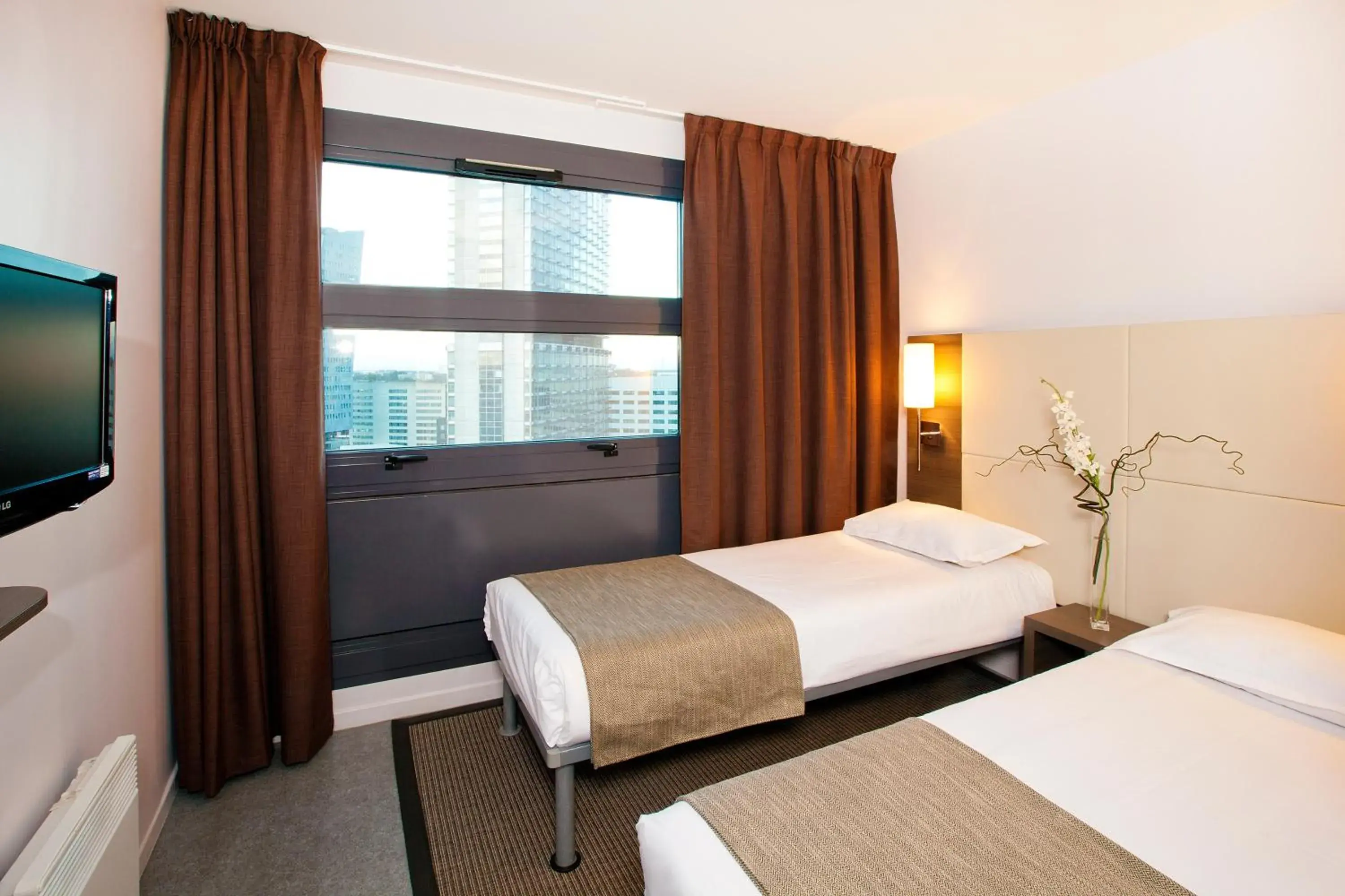 Bedroom, Bed in Séjours & Affaires Lille Europe Bedroom, Bed in Séjours & Affaires Lille Europe