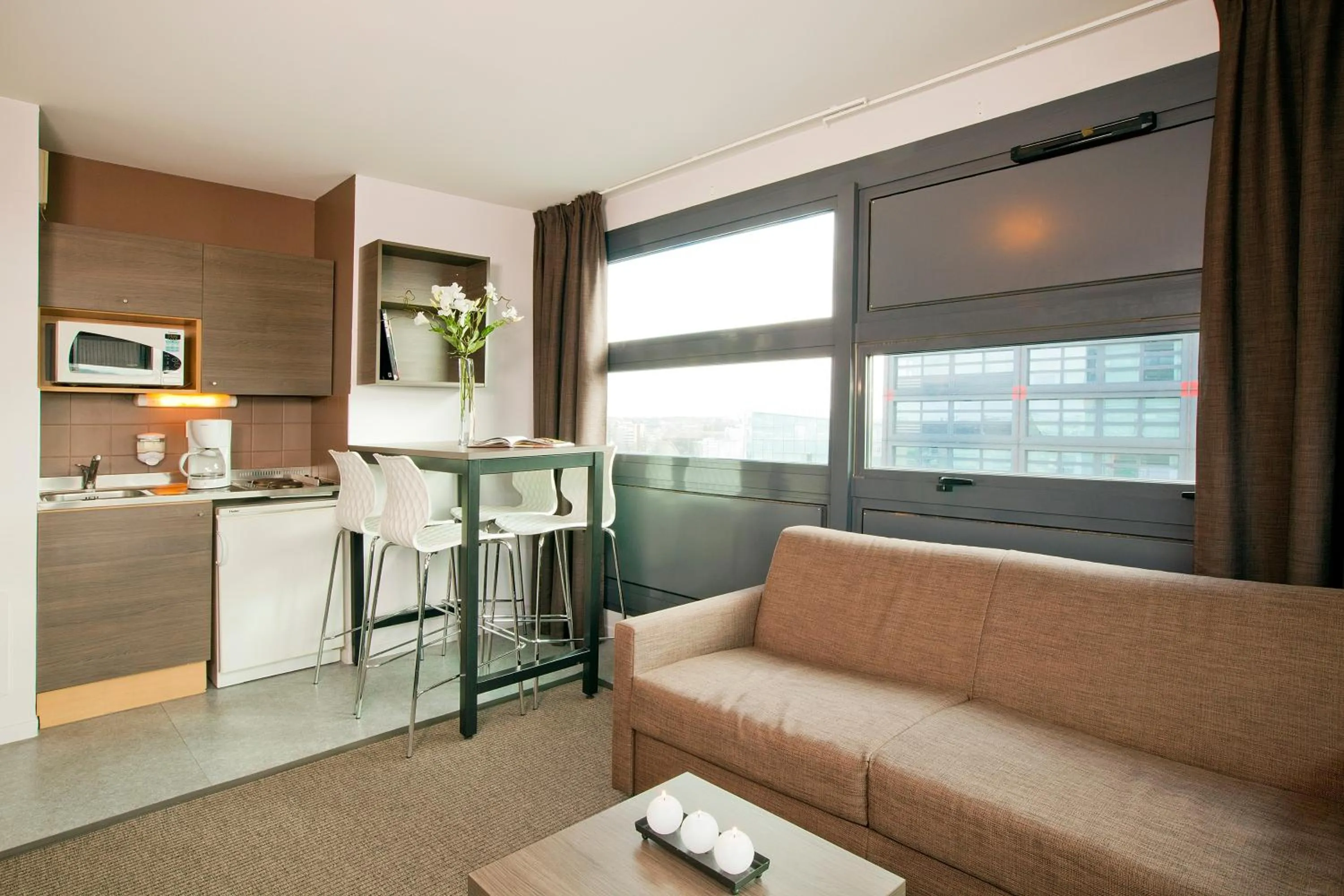 Living room in Séjours & Affaires Lille Europe