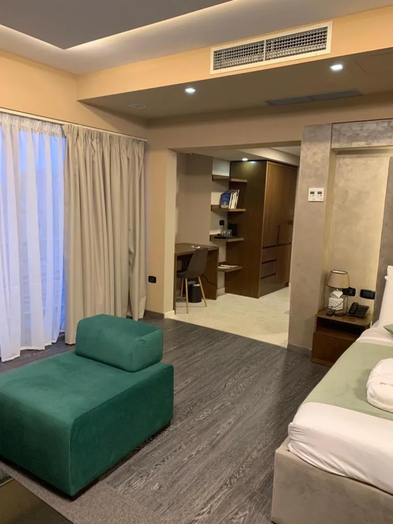 Living room, Bed in Albanopolis Hotel