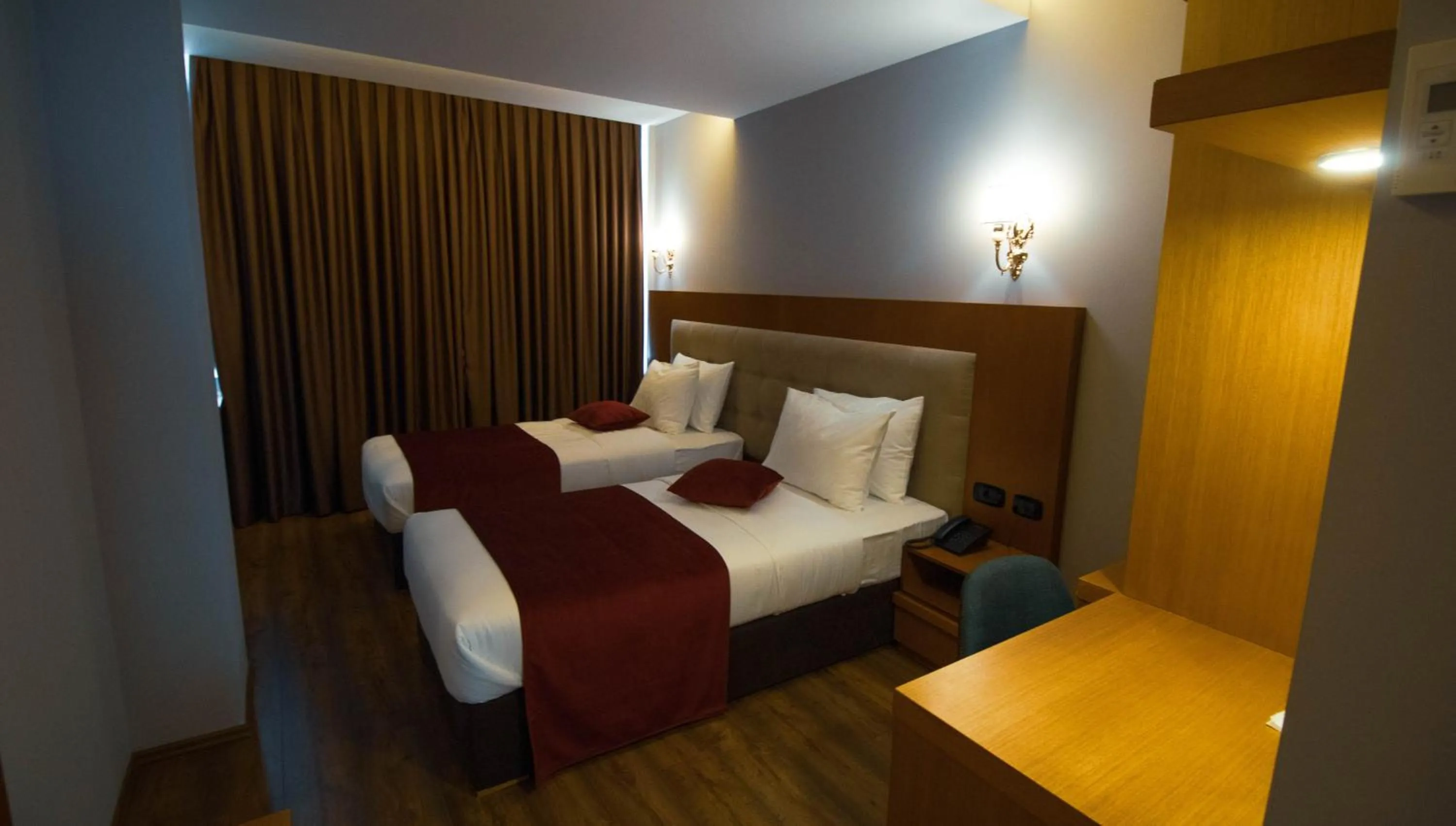 Bed in Albanopolis Hotel