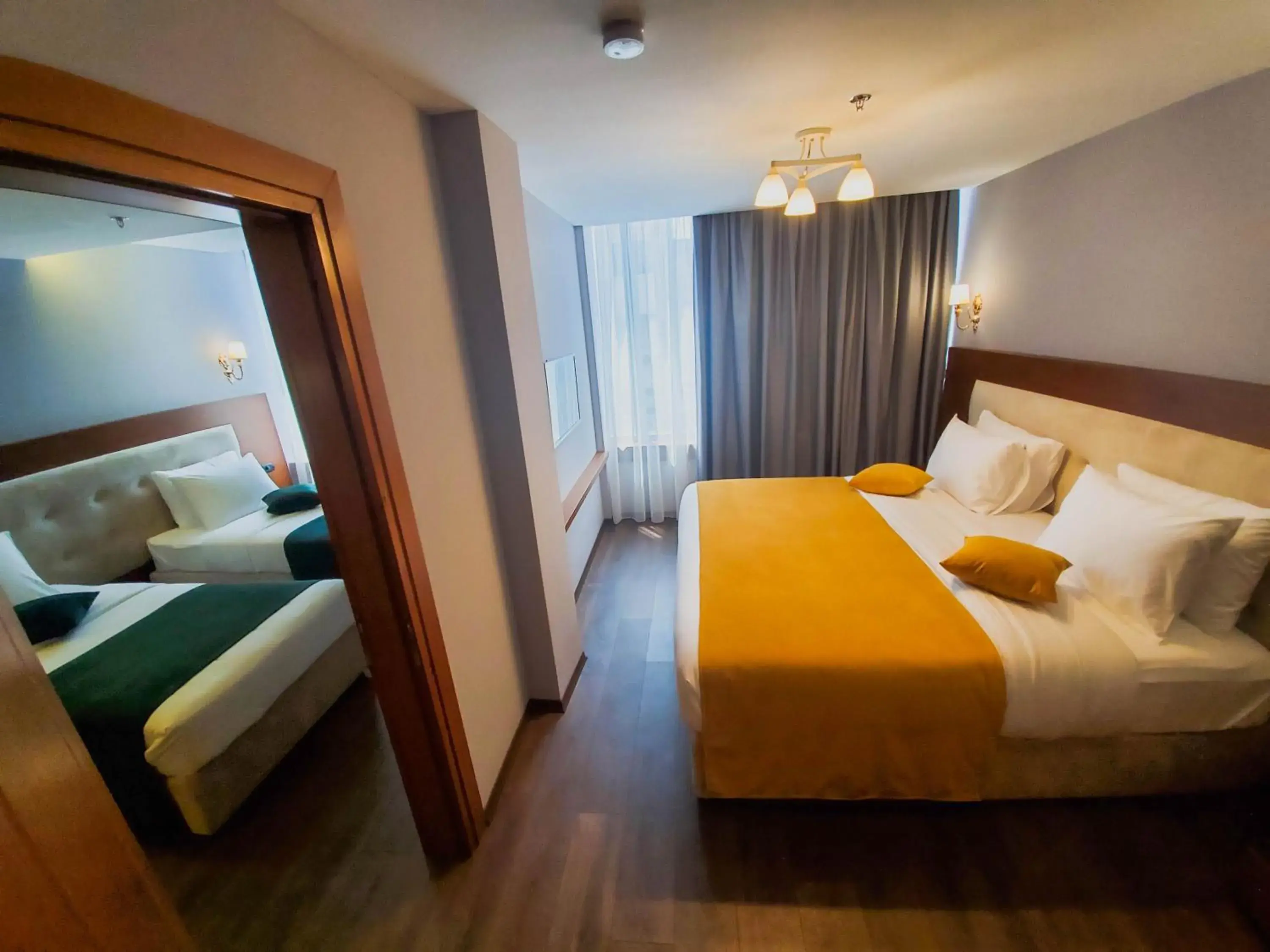 Family Room with Private Bathroom in Albanopolis Hotel Family Room with Private Bathroom in Albanopolis Hotel