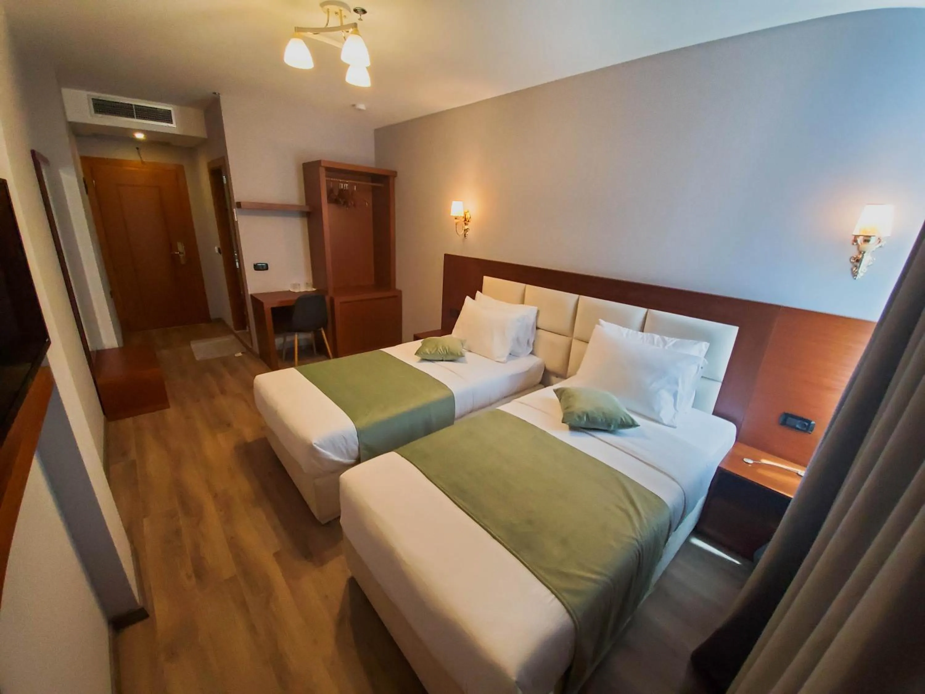 Bed in Albanopolis Hotel