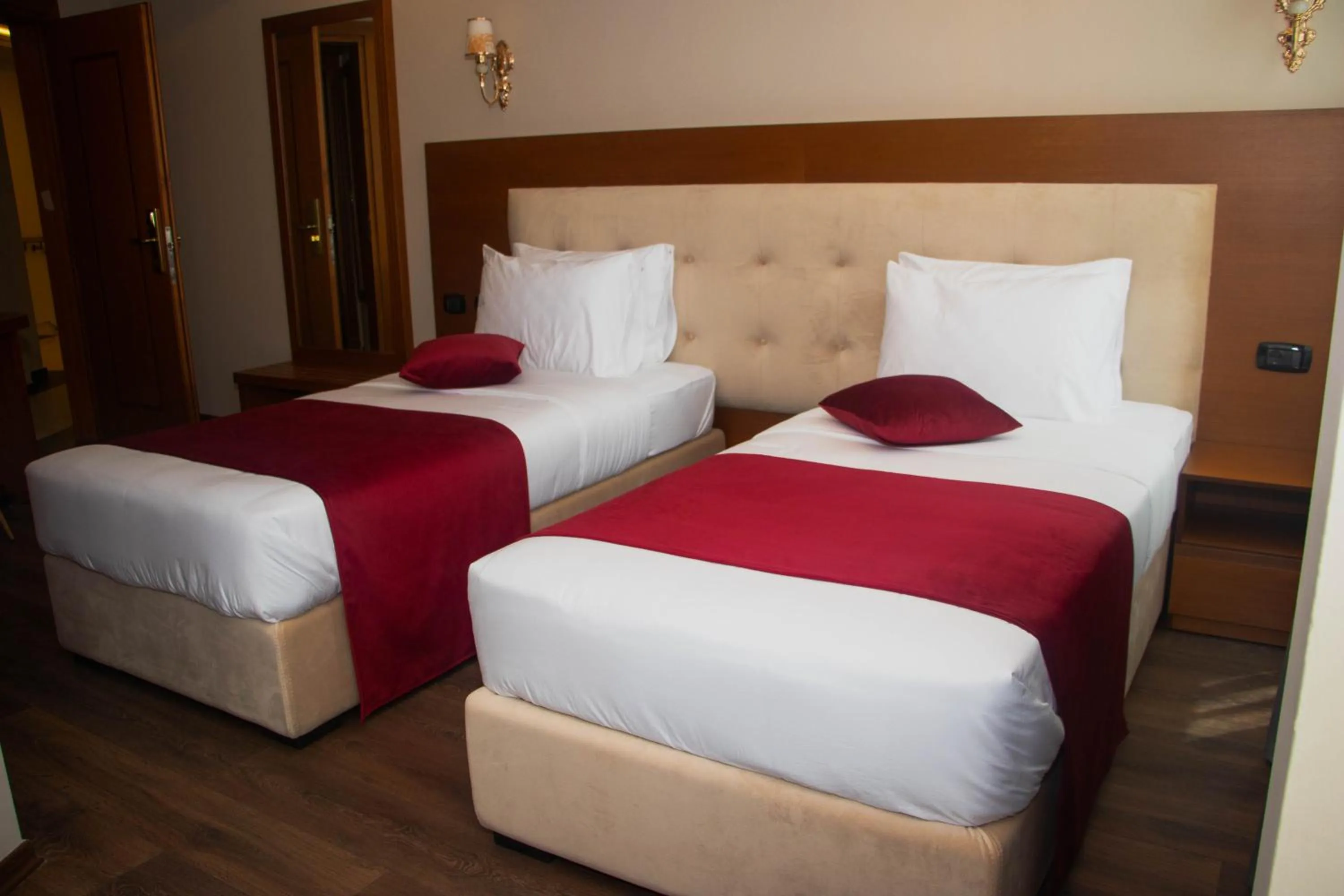 Bed in Albanopolis Hotel