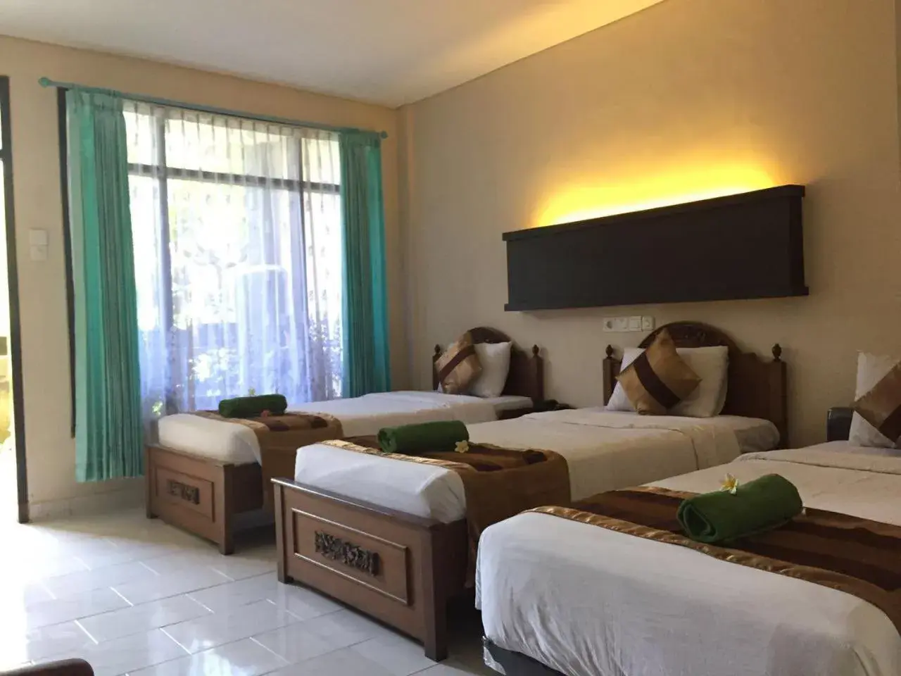 Bed in Bakung Beach Resort Bed in Bakung Beach Resort