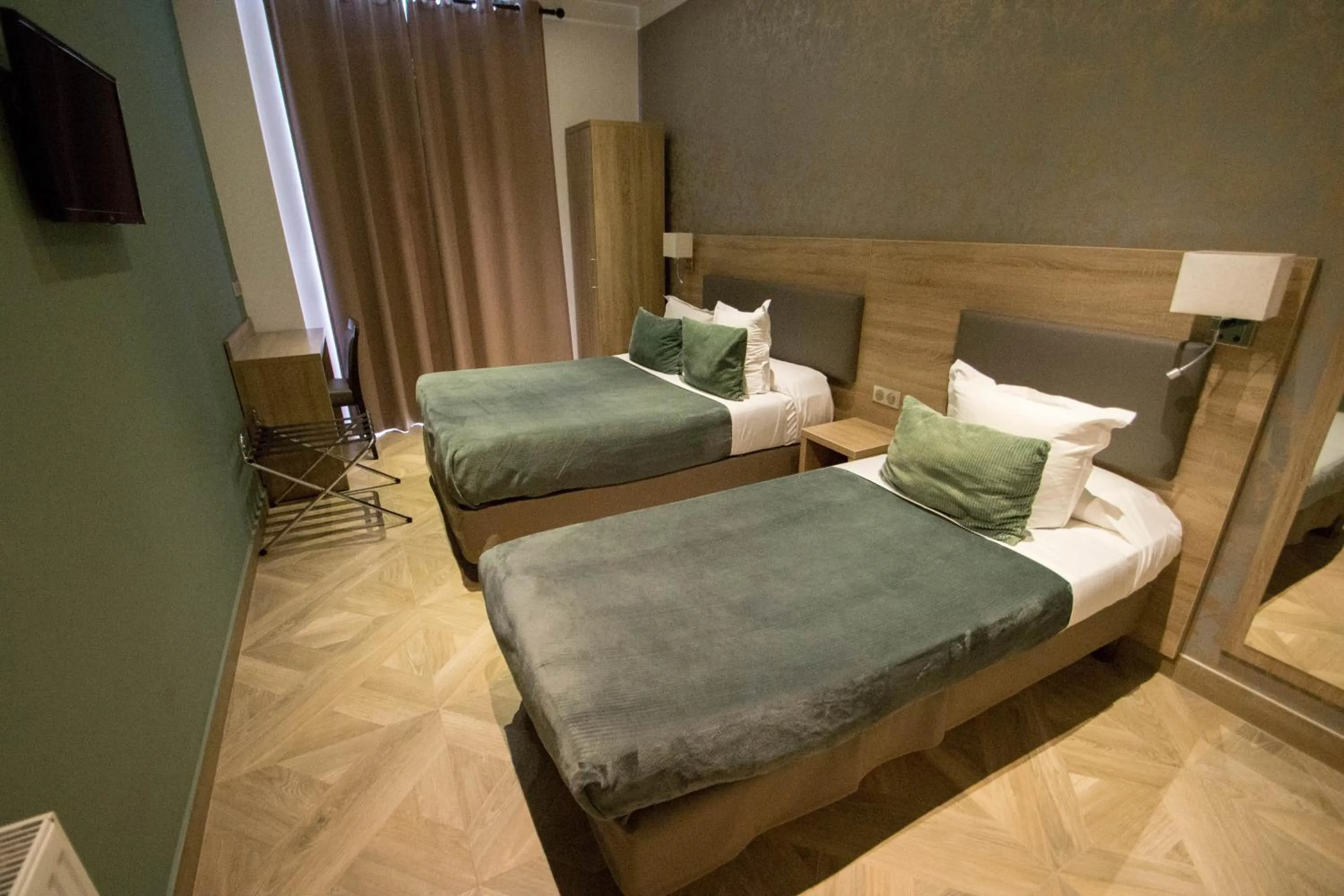 Bed in Hôtel Parisien