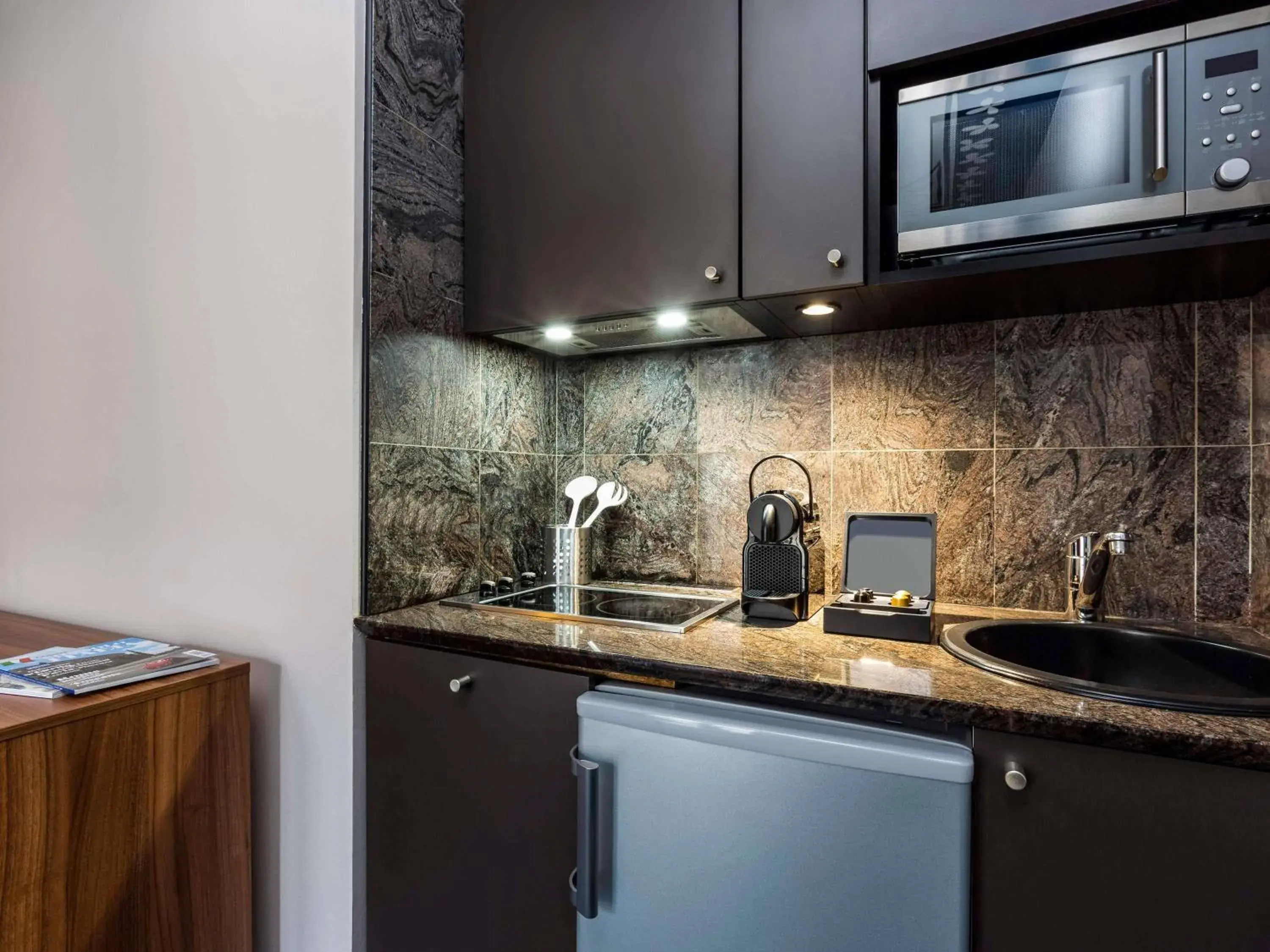 Bedroom in Aparthotel Adagio Paris Haussmann Champs Elysées Bedroom in Aparthotel Adagio Paris Haussmann Champs Elysées