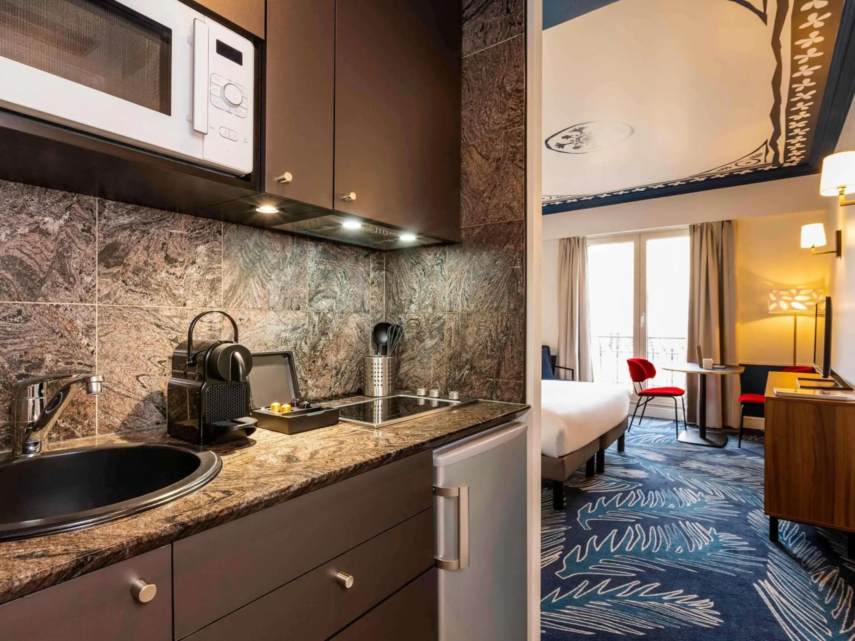 Bedroom in Aparthotel Adagio Paris Haussmann Champs Elysées Bedroom in Aparthotel Adagio Paris Haussmann Champs Elysées