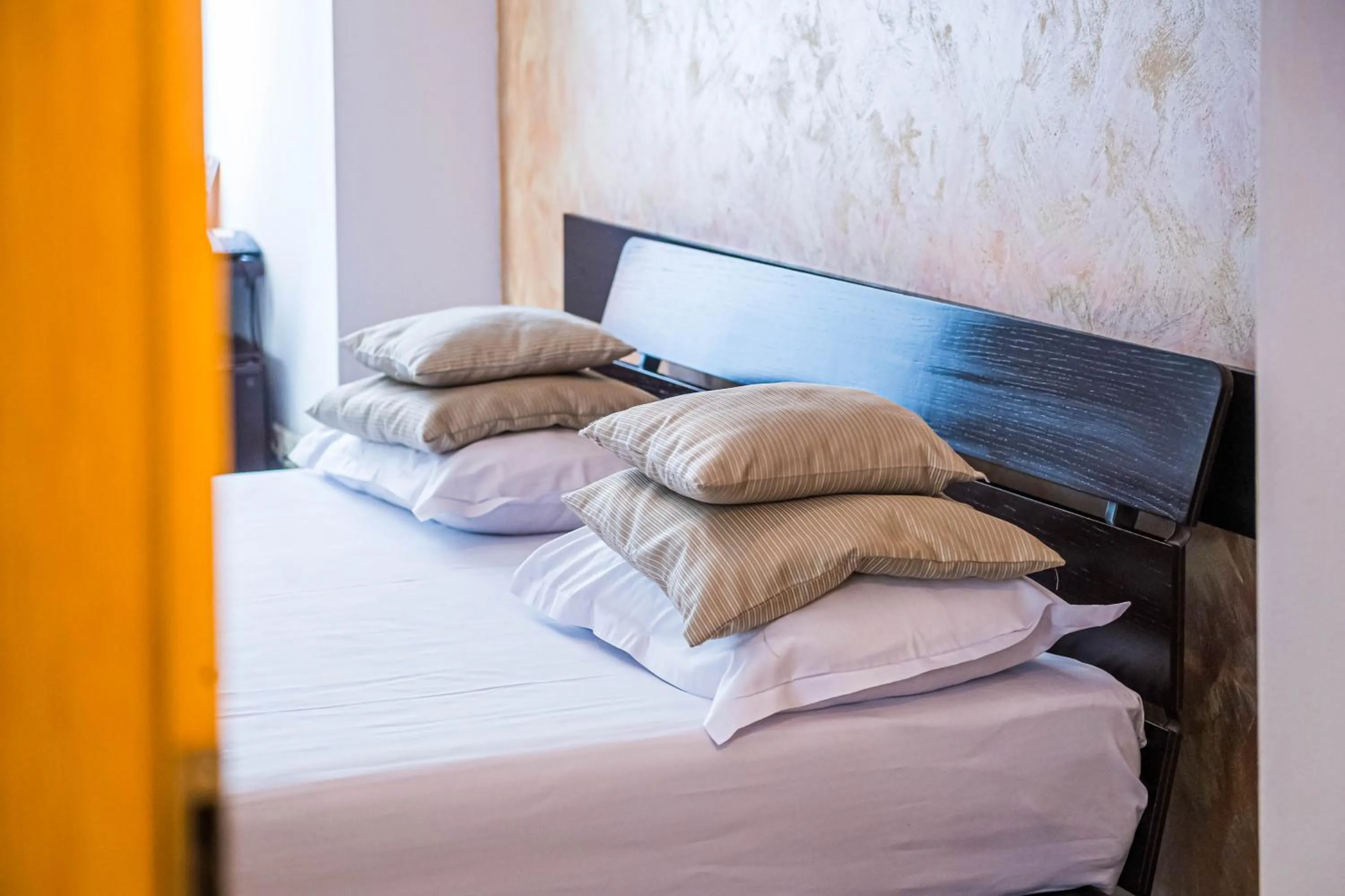 Bed in Do Stil Boutique Hotel