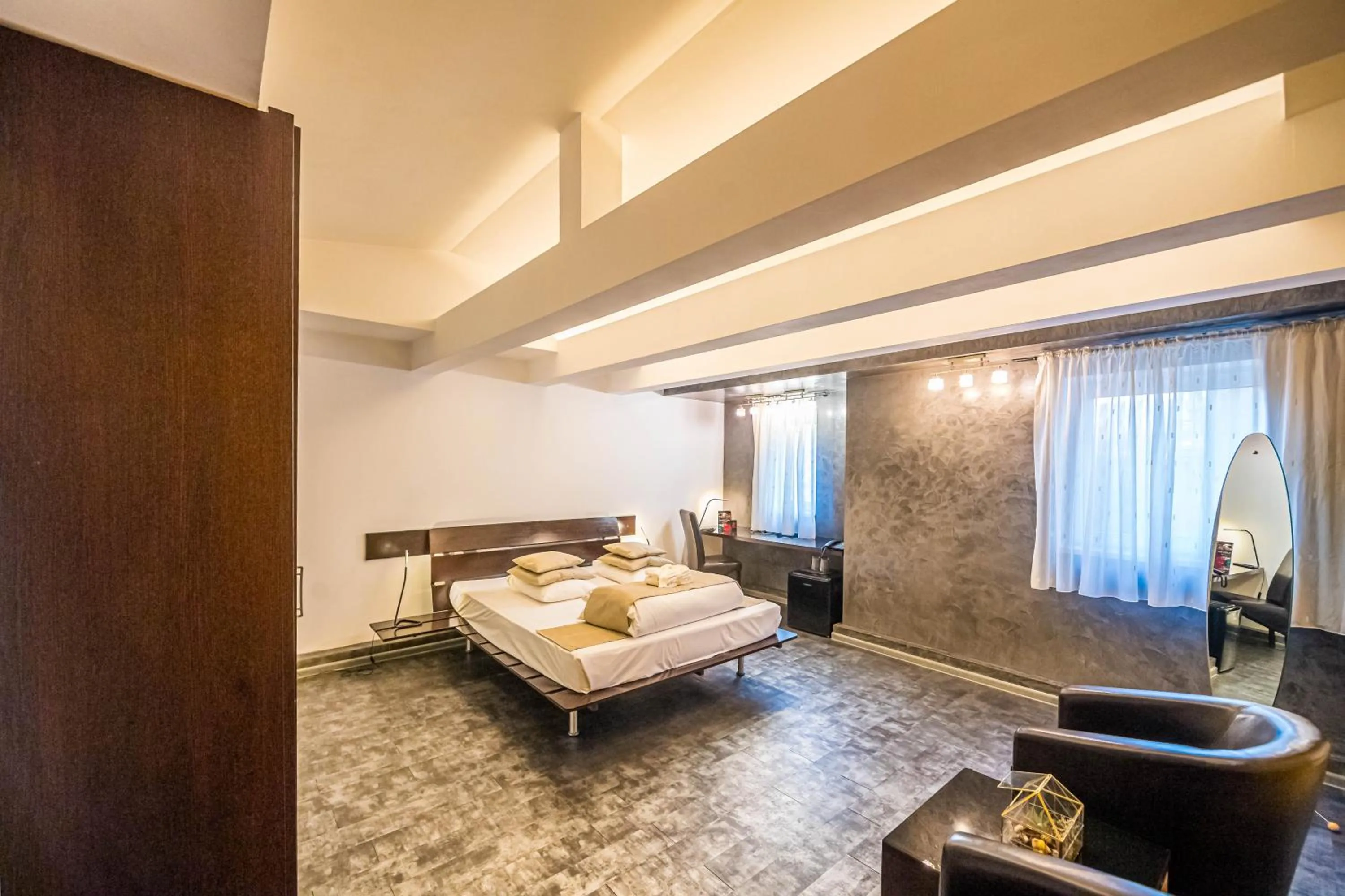 Bed in Do Stil Boutique Hotel