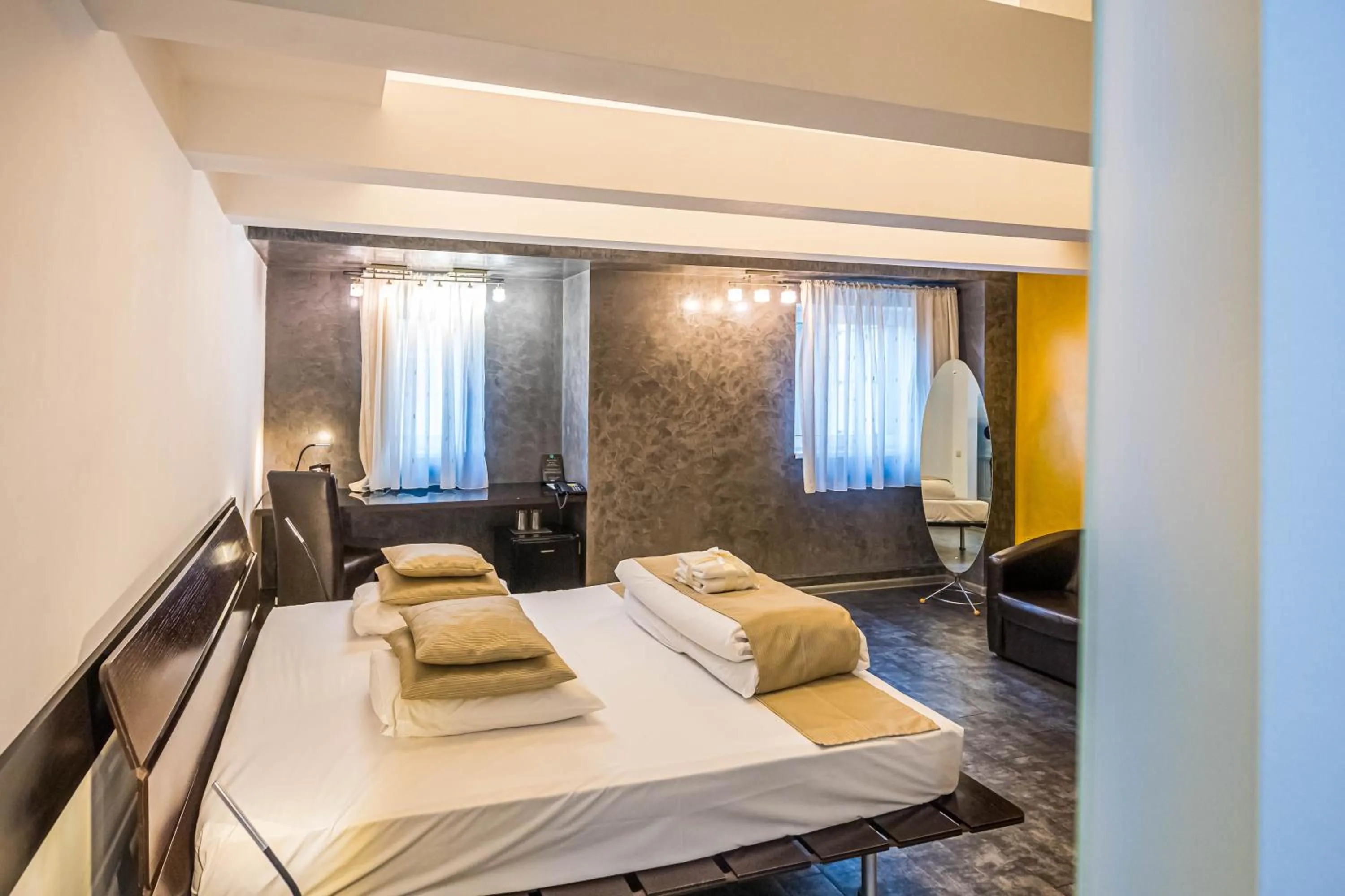 Bed in Do Stil Boutique Hotel